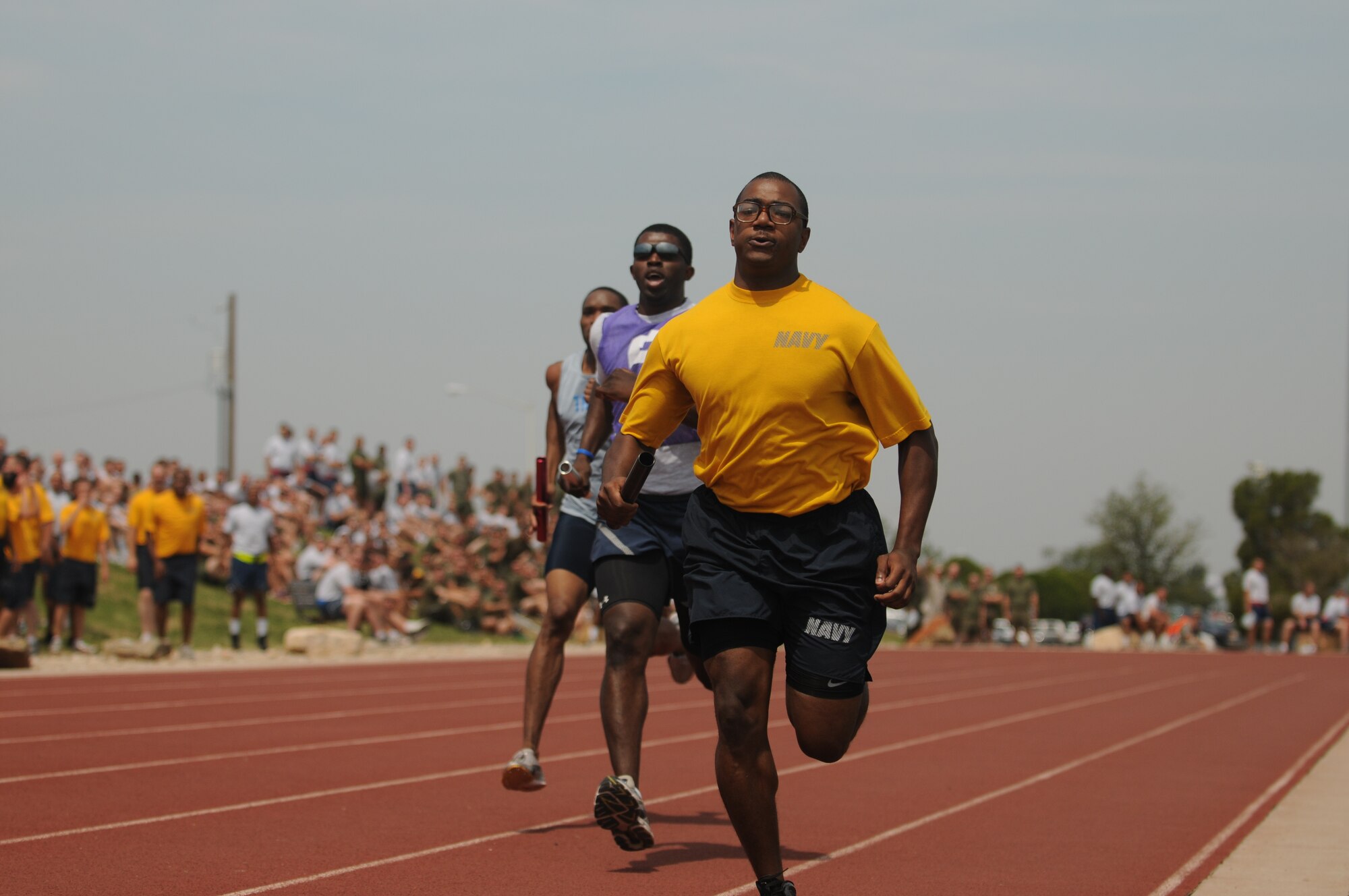 GOODFELLOW AIR FORCE BASE, Texas -- Team Goodfellow members participate in a one mile relay race May 27. Team Goodfellow devoted the day to safety and sports to kick off the 101 critical days of summer. (U.S. Air Force photo/Staff Sgt. Heather L Rodgers)