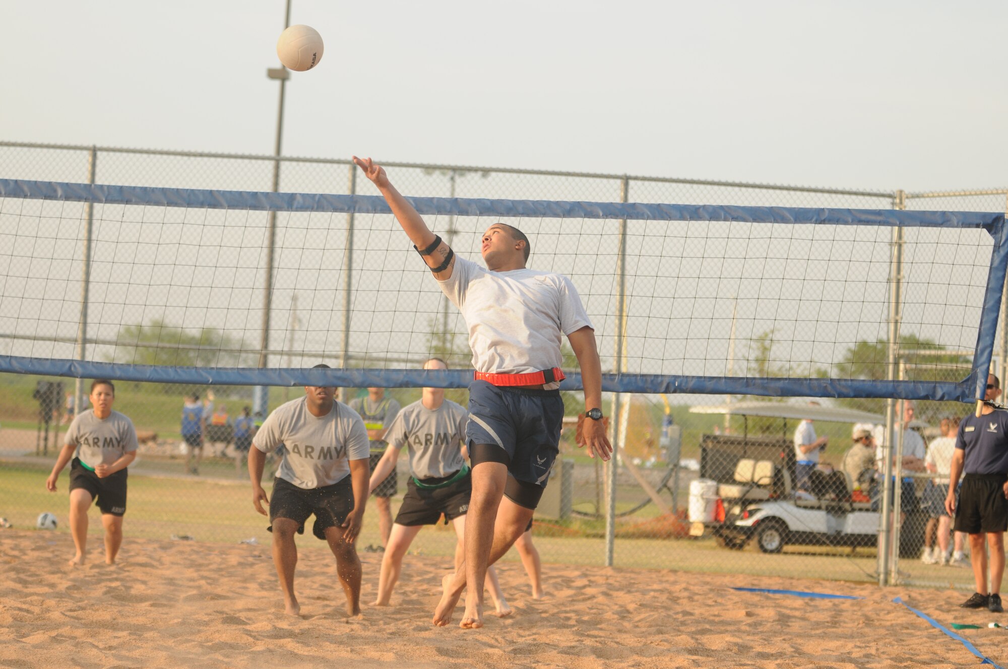 GOODFELLOW AIR FORCE BASE, Texas -- Airmen from the 312th Training Squadron participate in a volley ball game against Soldiers from the 344 Military Intelligence Battalion May 27. Team Goodfellow devoted the day to safety and sports to kick off the 101 critical days of summer. (U.S. Air Force photo/Staff Sgt. Heather L Rodgers)