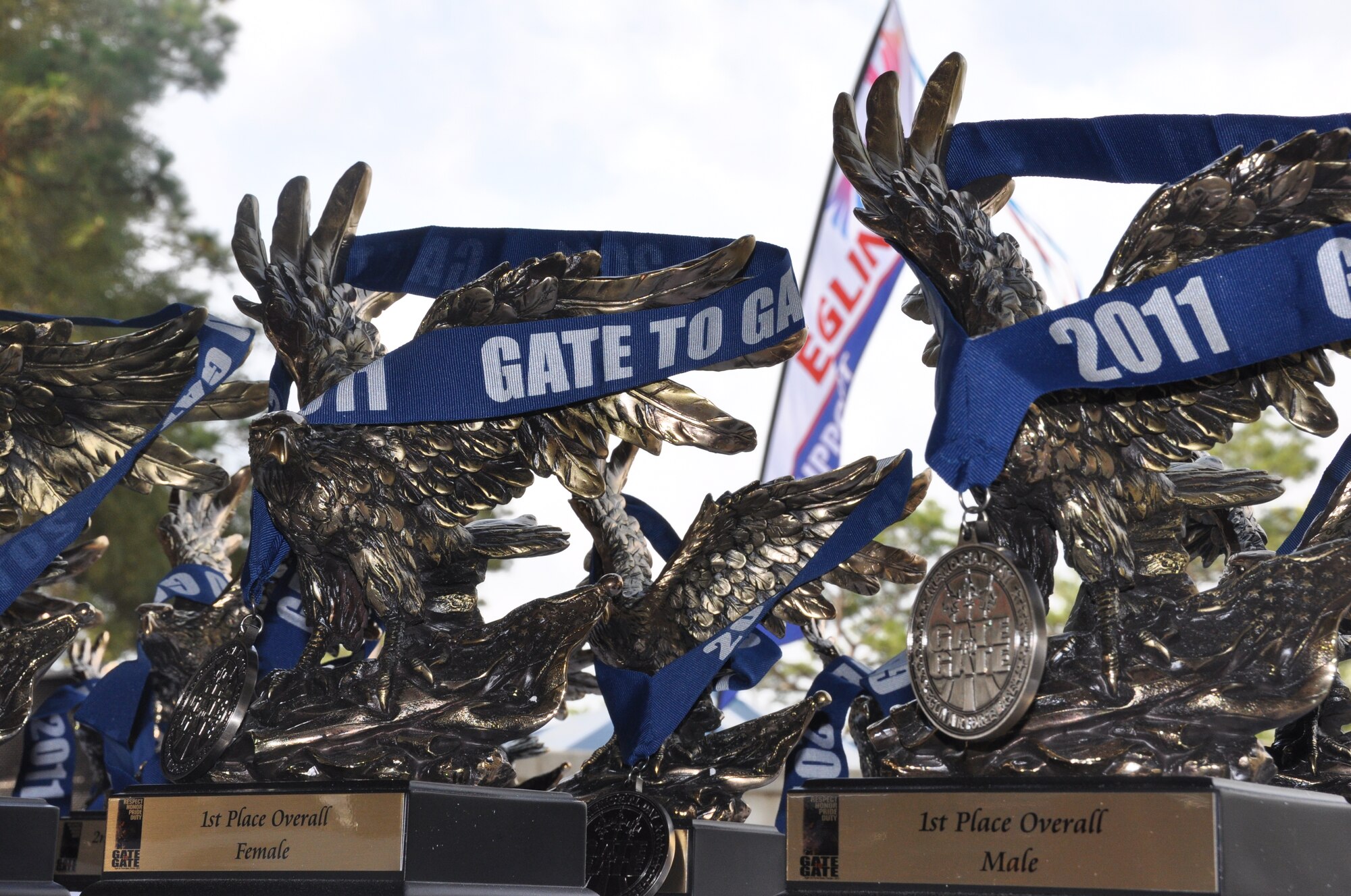 Trophies are ready to hand out after Eglin's 26th annual Gate-to-Gate run honoring Memorial Day. Matt Dobson had the fastest time of the day (24:21) to finish as the overall male winner. Pasca Cheruiyot won the women’s overall division with a time of 25:18. The base traditional event drew 1,939 participants to the starting line of the 4.4 mile course May 30. Race results for divisions in wheelchair, running, walking and specific age groups are posted on www.active.com. (U.S. Air Force photo/Chrissy Cuttita).