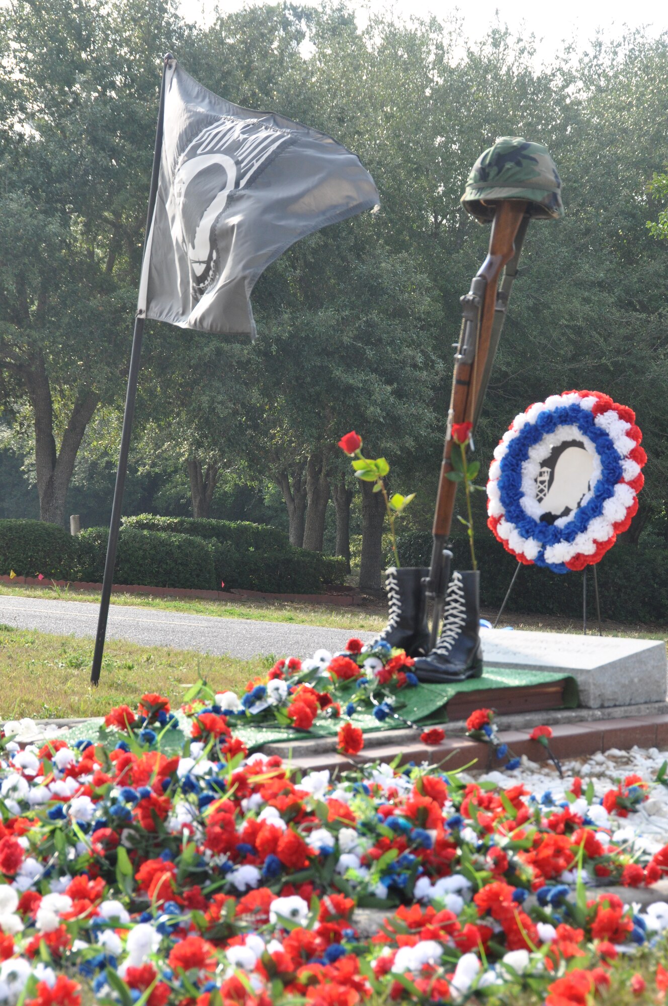 A memorial to fallen soldiers is displayed at the All Veterans Memorial during Eglin's 26h Annual Gate-to-Gate run in remembrance of those who served. The base traditional event honoring Memorial Day drew 1,939 participants to the starting line of the 4.4 mile course May 30. Race results for divisions in wheelchair, running, walking and specific age groups are posted on www.active.com. (U.S. Air Force photo/Chrissy Cuttita)