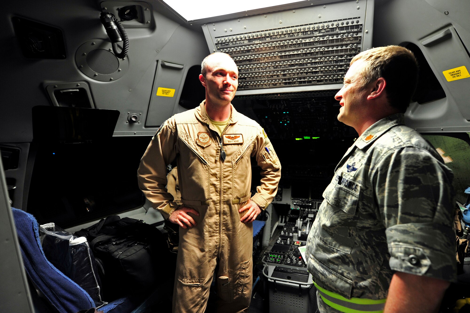 Capt. Matthew Read (left), 17th Airlift Squadron C-17 Globemaster III co-pilot greets his uncle Maj. Peter Mastroianni, 621st Contingency Response Element commander on the flightline of Mihail Kogalniceanu Air Base, Romania, May 22.  Uncle and nephew are both serving with the 385th Air Expeditionary Group while deployed here supporting an airfield runway closure in the region and a U.S. Transportation Command multi-modal proof-of-principle evaluation.  (U.S. Air Force photo by Master Sgt. Laura K. Deckman/released)