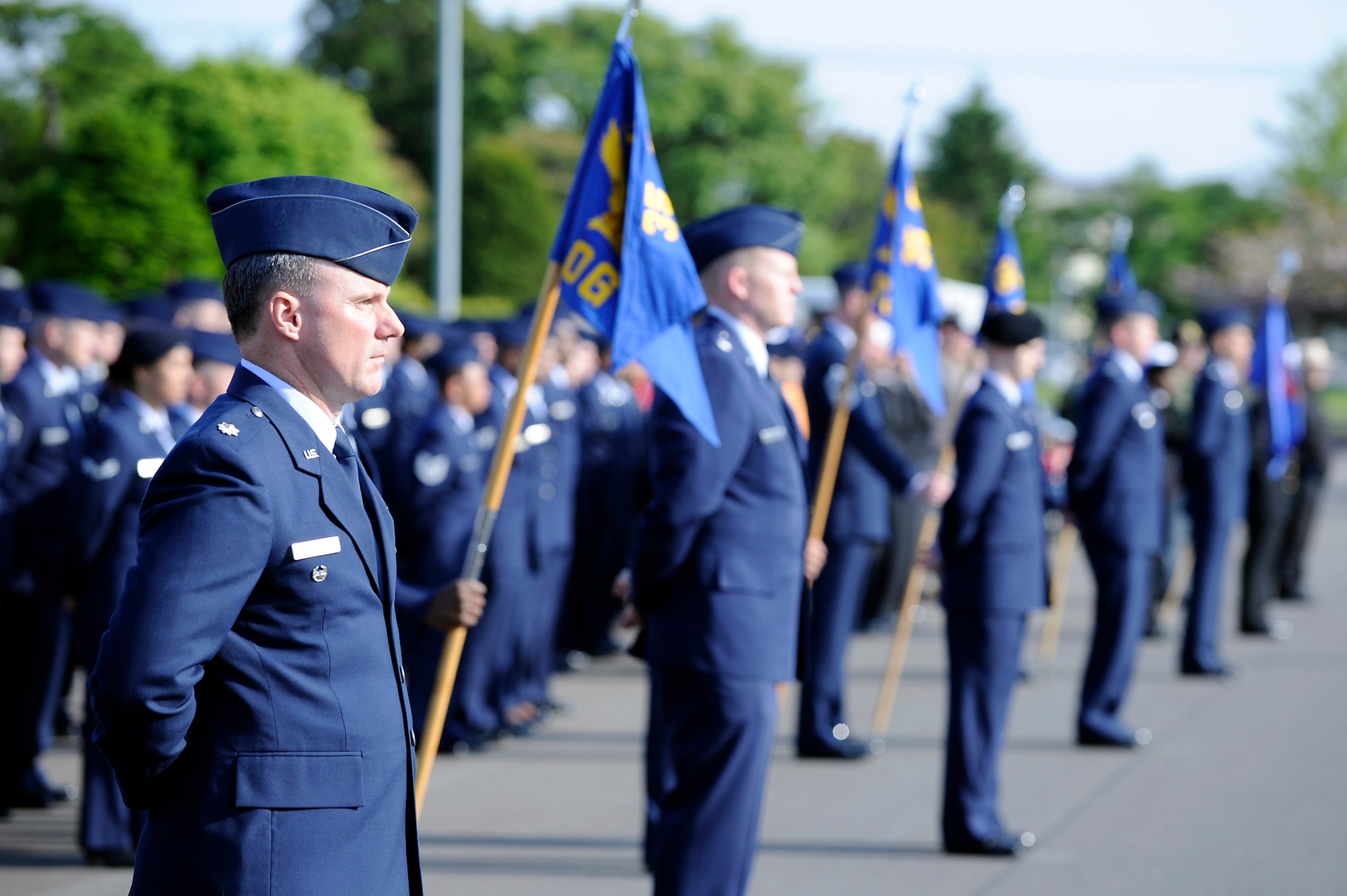 MISAWA AIR BASE, Japan -- Active-duty and retired military members from across the base stand in formation at Risner Circle to pay respects during a Memorial Day Retreat Ceremony May 26. Memorial Day is a day for people to reflect and recognize their deceased relatives, while also commemorating all U.S. servicemembers who died in our nation's service. (U.S. Air Force photo/Staff Sgt. Marie Brown/Released)
