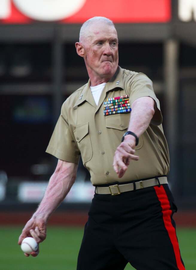 Major Gen. Richard Mills throws out the ceremonial first pitch at Citi Field May 30, 2011. Various units from II Marine Expeditionary Force and Marine Forces Reserve have organized under the 24th Marine Expeditionary Unit to form the Special Purpose Marine Air Ground Task Force - New York. The Marines embarked on the Navy's Amphibious Assault Ships, the USS Iwo Jima (LHD -7) and USS New York (LPD-21) to take part in Fleet Week New York 2011 from May 25 to June 1. The Marines will showcase the capabilities of the MAGTF, and also honor those who have served by participating in various events during the Memorial Day weekend.