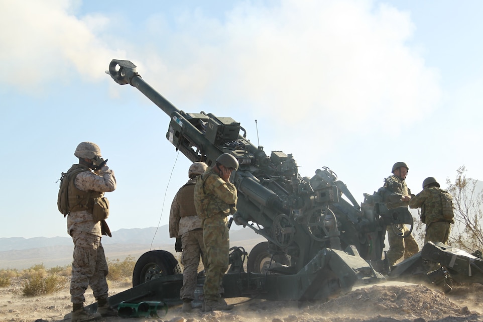 Marines of Gun Six,  Battery L, 3rd Battalion, 11th Marine Regiment work with soldiers of the Australian Army to fire the M777 A2 Howitzer during the Golden Eagle exercise held at Lead Mountain training area Nov. 1, 2011.