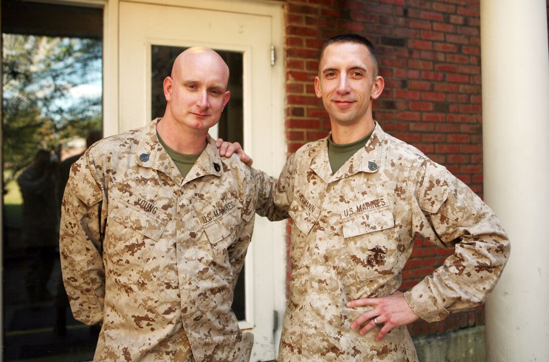 Staff Sgt. William J. Hermann, substance abuse control officer with Combat Logistics Regiment 27, 2nd Marine Logistics Group, poses with Staff Sgt. Luke Young, a fellow SACO, outside CLR-27 headquarters aboard Camp Lejeune, N.C., Nov. 1, 2011. Herman was nominated and received the Marine Corps Installations East SACO of the Year award. (U.S. Marine Corps photo by. Pfc. Franklin E. Mercado)