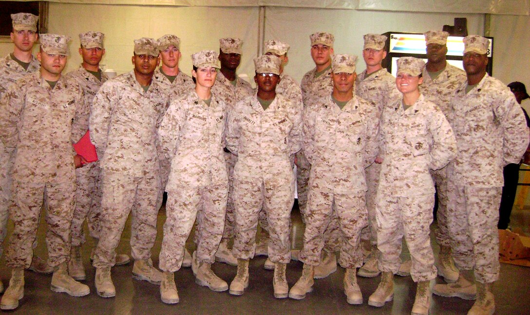 Staff Sgt. Rodell Terry (front row, far right), a section staff noncommissioned officer with Food Service Company, 2nd Marine Logistics Group, poses with his fellow food service Marines while deployed to Camp Leatherneck, Afghanistan in 2011.  Terry was recognized as the Active Duty Staff NCO Food Service Specialist of the Year as part of the 2012 Maj. Gen. W.P.T. Hill Memorial Awards Program for Food Service Excellence.  (Courtesy Photo)