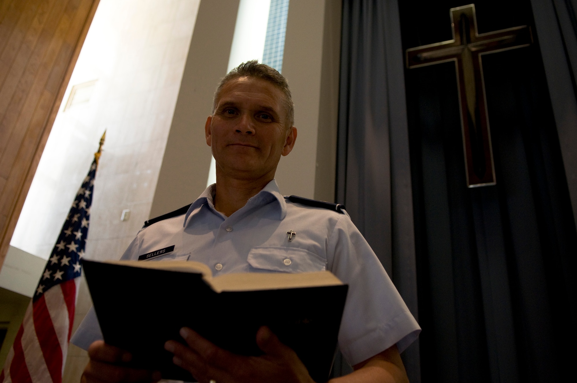 U.S. Air Force Chaplain (Maj.) Randy Sellers, 18th Wing deputy wing chaplain, holds his Bible at Chapel 2 on Kadena Air Base, Japan, Oct. 31. Sellers said though he's been in the Air Force for roughly 12 years, he's been in pastoral ministry for around 28 years total. (U.S. Air Force photo/Airman 1st Class Maeson L. Elleman/released) 