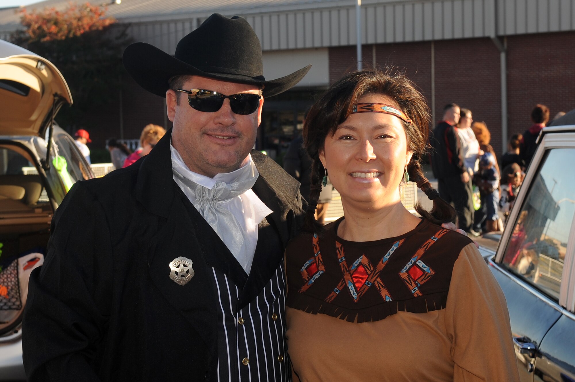 U.S. Air Force Col. Don Godier, 20th Fighter Wing vice commander, and his wife, Gina Godier, support  military families at Shaw?s Halloween celebration, Boo Bash, at Shaw Air Force Base, S.C., Oct. 29, 2011.The Boo Bash is held annually for military families to enjoy the festivities. (U.S. Air Force photo by Airman First Class Hunter Brady/Released)



