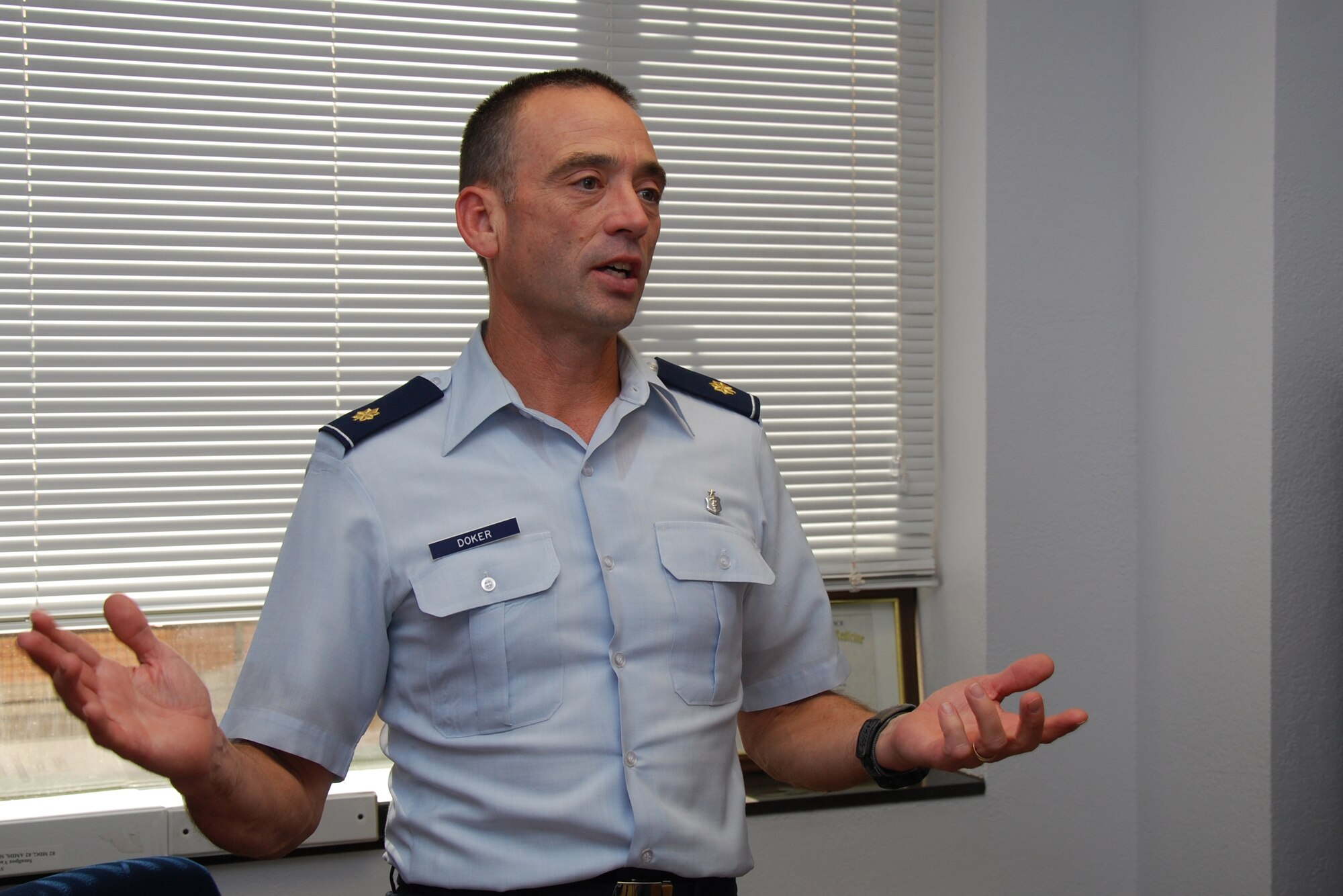 Maj. Thomas Doker, 82nd Medical Group Public Health, discusses further education opportunities for a public health officer. Major Doker was selected for a two-year fellowship with the Center for Disease Control’s Epidemic Intelligence Service, Oct. 28, 2011, a program focused on epidemiology – the study of health statistics and surveillance in a population. (U.S. Air Force photo/Capt. Brittany Martin)