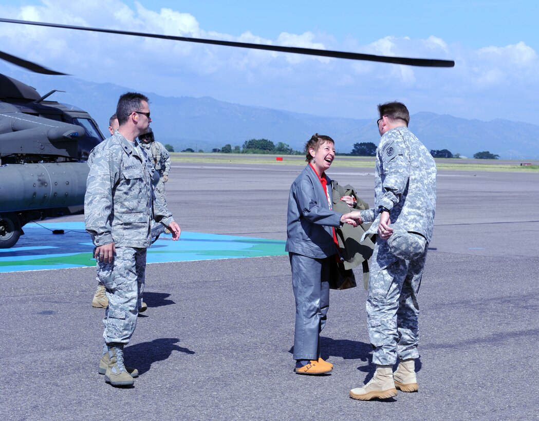 Ambassador Tatiana Gfoeller, Foreign Policy Advisor, meets with Col. Ross Brown, Joint Task Force-Bravo commander Oct. 28, 2011, at Soto Cano Air Base, Honduras. Ambassador Gfoeller’s visit included a tour of base construction sites, Morale Welfare Recreation building, Medical Element and the base exchange. (U.S. Air Force photo/Martin Chahin) 