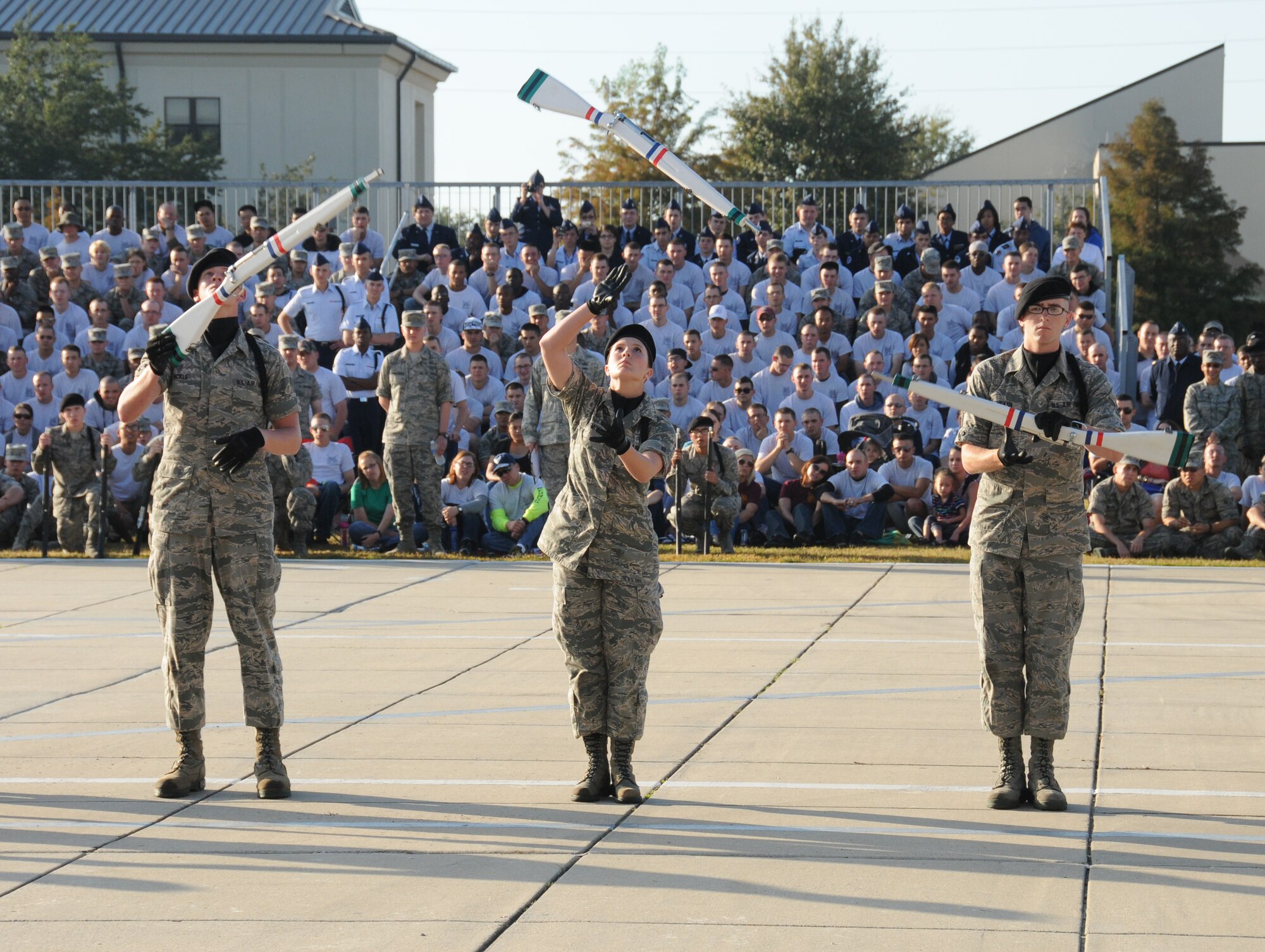 Airmen Basic Matthew Hickle and Olivia Huffman and Airman 1st Class Dylan Fiveash, 334th Training Squadron students, perform during the freestyle portion of the quarterly drill down competition Oct. 28, 2011, at Keesler Air Force Base, Miss.  The Gators won first place in all four categories during the final drill down of the season.  (U.S. Air Force photo by Kemberly Groue)