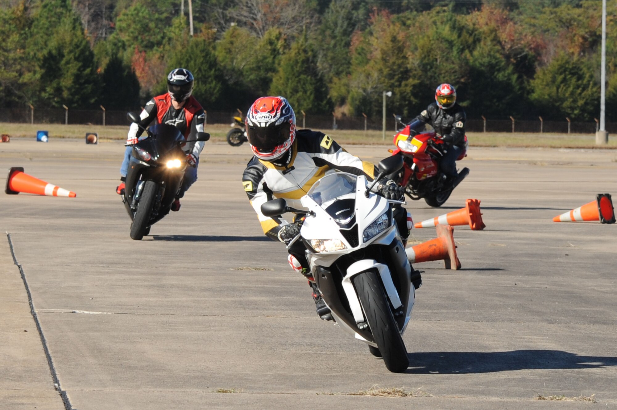 Senior Master Sgt. Nathan Lakin, 19th Equipment Maintenance Squadron superintendent, leads riders through the circuit training course Oct. 31, 2011 at Little Rock Air Force Base, Ark. The motorcycle safety course was held Oct. 29-31, and consisted of brake and motorcycle courtesy training for the experienced riders.