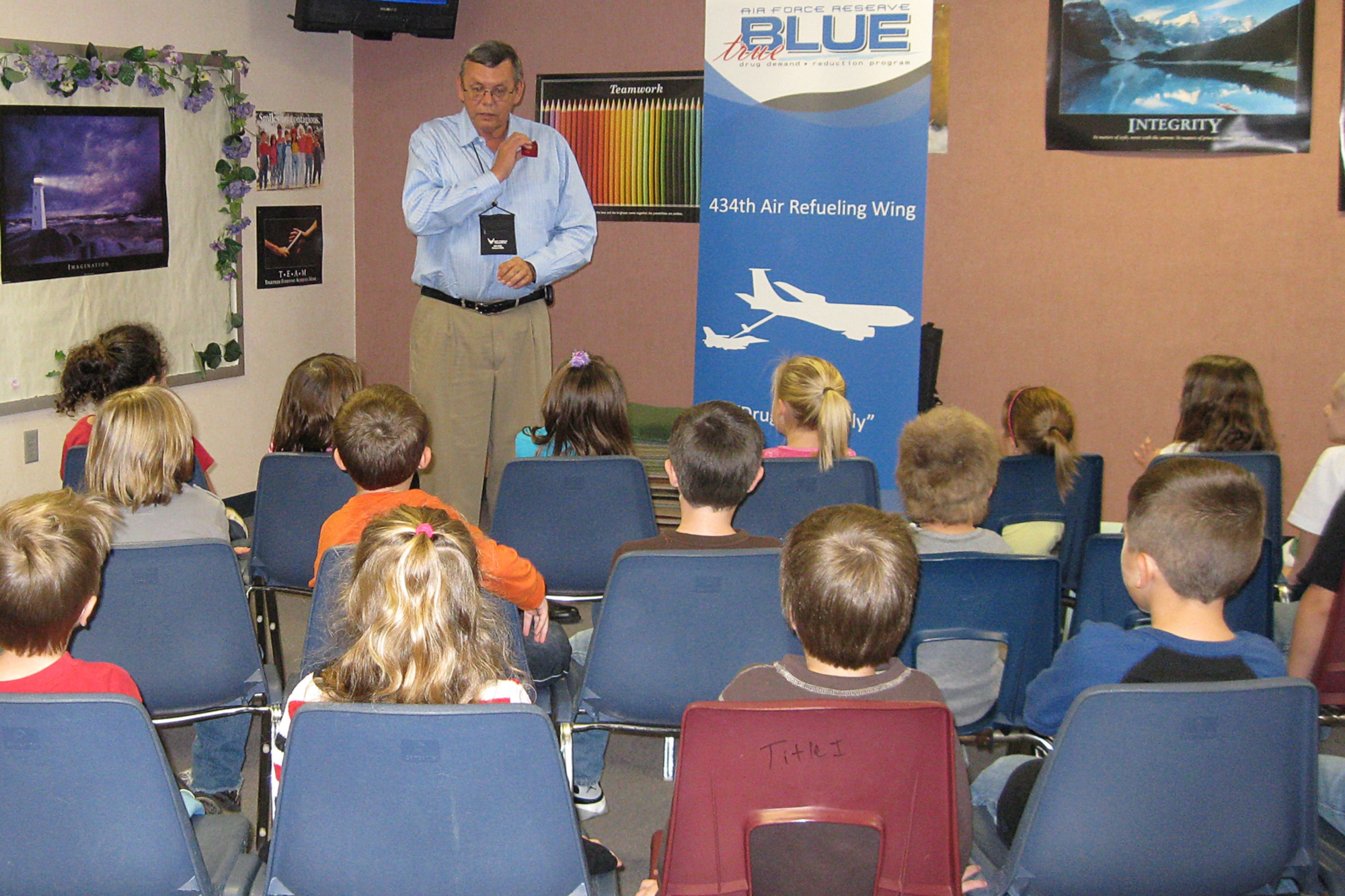 GRISSOM AIR RESERVE BASE, Ind.-- Gary Flook, Grissom's drug demand reduction specialist, explains to a group of Pipe Creek Elementary, Peru, Ind., students the origins of Red Ribbon Week during an anti drug, tobacco and alcohol presentation on Oct. 27. Red Ribbon Week is the nation's largest and oldest drug prevention program, which reaches millions of Americans during the last week of October every year. (U.S. Air Force photo/ Staff Sgt. Lisette Pittman)          