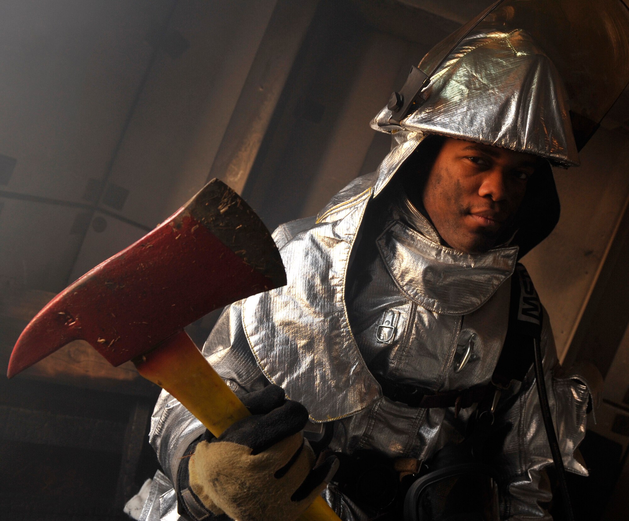 Airman Darby Parker, 19th Civil Engineer Squadron firefighter, poses for a photo Oct. 28, after building clearing and structural fire training. The 19th CES firefighters are required to complete 18 classes for upgrade training and to remain firefighter certified afterwards. (U.S. Air Force photo by Senior Airman Caleb Pierce)