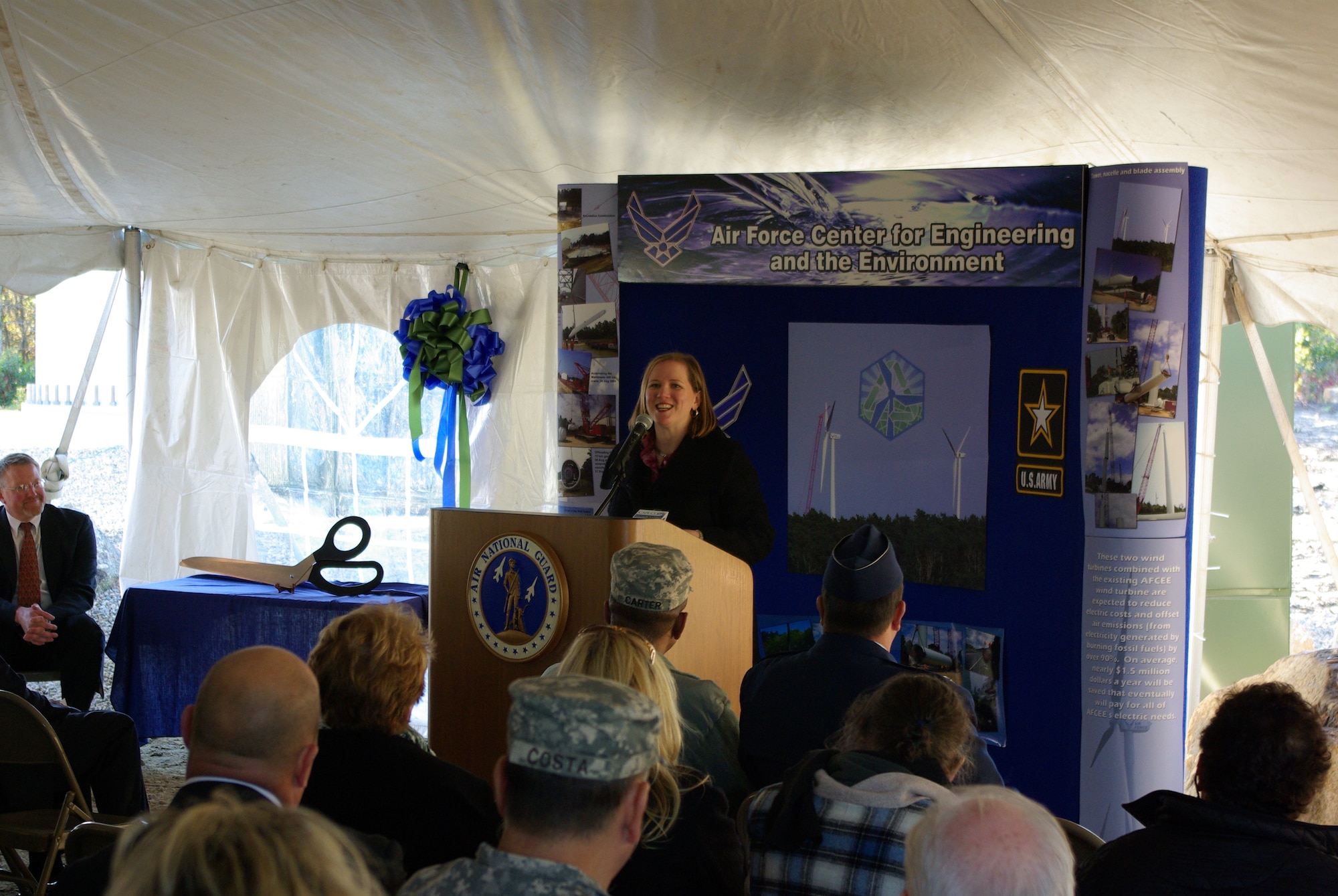 Under secretary of the Air Force Erin Conaton speaks at a ribbon cutting ceremony for two new Air Force wind turbines Oct. 28, 2011, at the Massachusetts Military Reservation in Cape Cod, Mass. The 1.5 megawatt wind turbines, in addition to an existing turbine, were built to offset electrical costs for powering numerous groundwater cleanup systems
at the reservation. The turbines will pay for all the Air Force's electric needs for groundwater remediation at MMR, saving more than $1.5 million per year. They will also offset emissions generated by fossil-fueled power plants, reducing the Air Force's carbon footprint. (U.S. Air Force photo/Scott Dehainaut)
