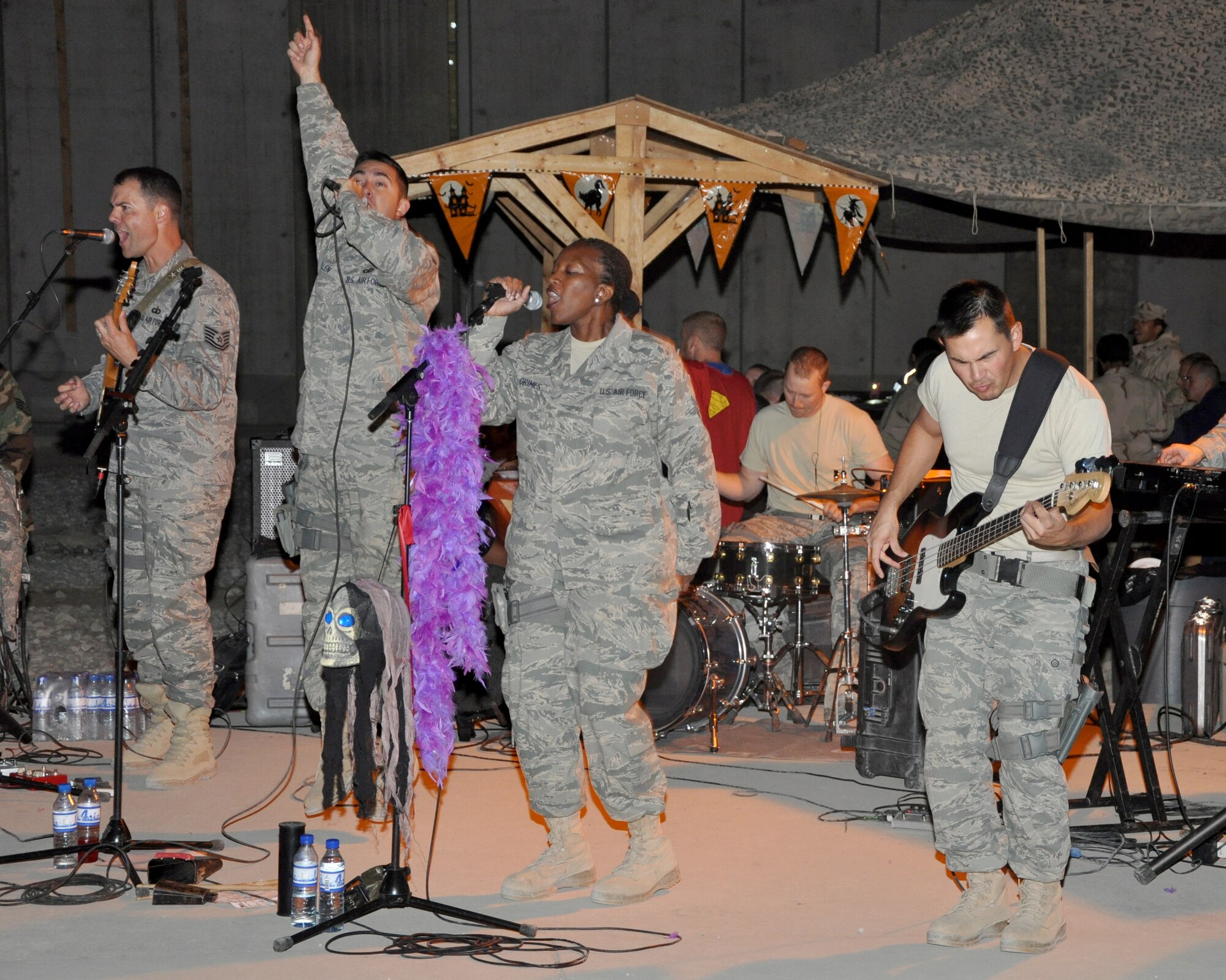 U.S. Air Forces Central Band, “Top Cover,” performs Halloween night for 455th Air Expeditionary Wing Airmen Oct. 31, 2011. Top Cover is deployed from Joint Base Elmendorf-Richardson, Alaska. (U.S. Air Force photo/ Master Sgt. Mary Davis)