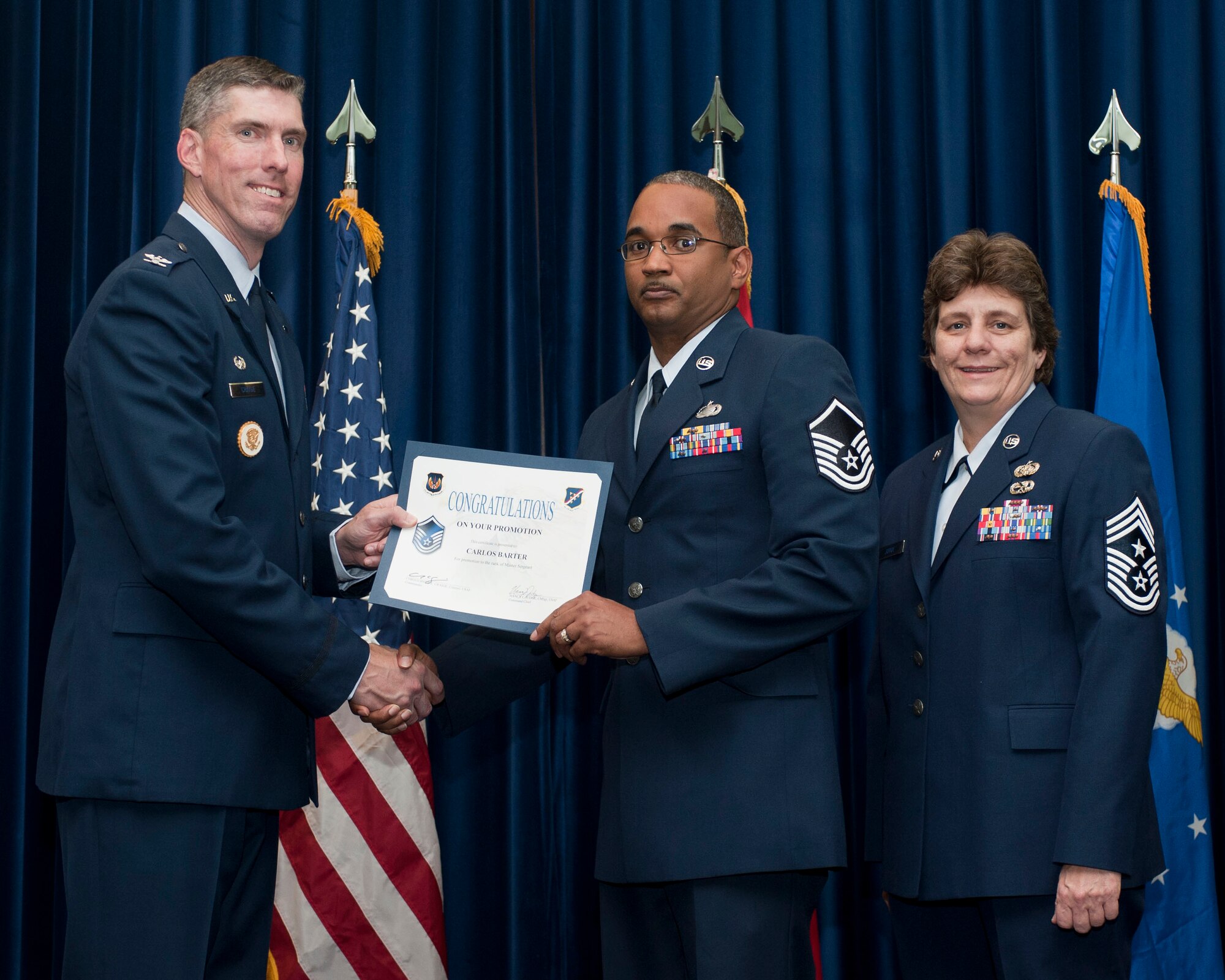 Carlos Barter, 39th Air Base Wing, is promoted to the rank of master sergeant Oct. 31, 2011, in the Club Complex ballroom at Incirlik Air Base, Turkey.(U.S. Air Force photo by Senior Airman Clayton Lenhardt/Released)