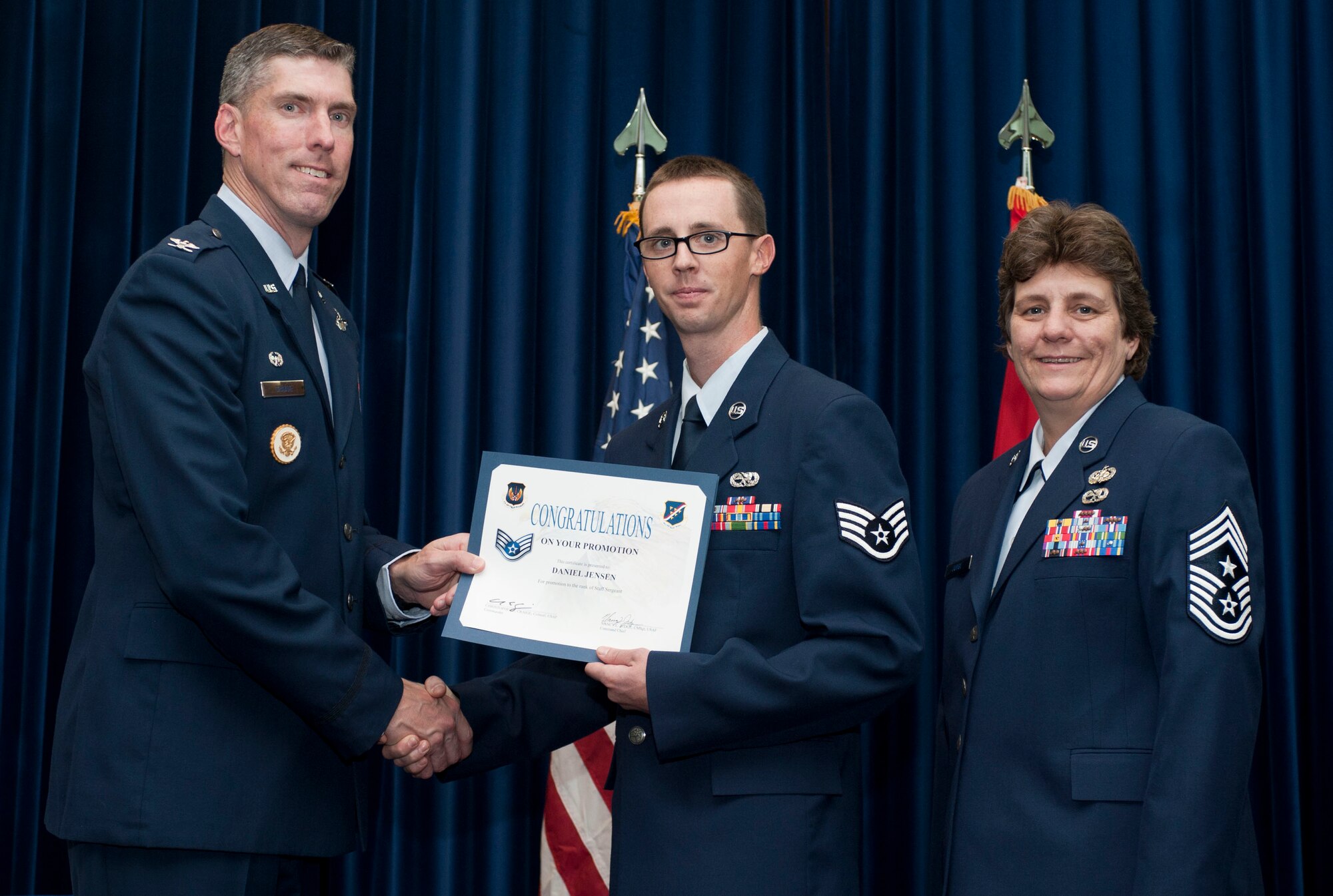 Daniel Jensen, 728th Air Mobility Squadron, is promoted to the rank of staff sergeant Oct. 31, 2011, in the Club Complex ballroom at Incirlik Air Base, Turkey.(U.S. Air Force photo by Senior Airman Clayton Lenhardt/Released)