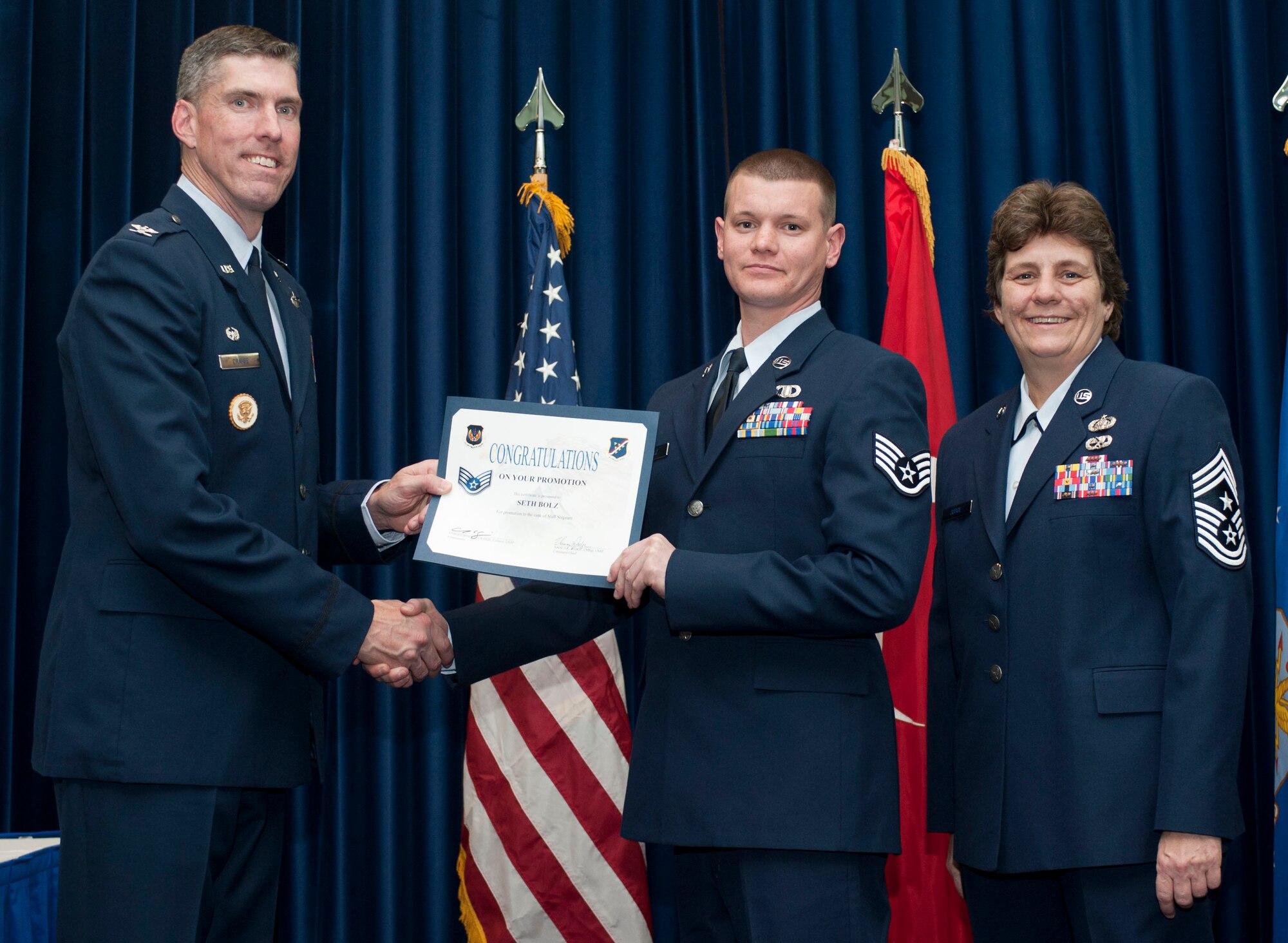 Seth Bolz, 39th Operations Squadron, is promoted to the rank of staff sergeant Oct. 31, 2011, in the Club Complex ballroom at Incirlik Air Base, Turkey.(U.S. Air Force photo by Senior Airman Clayton Lenhardt/Released)