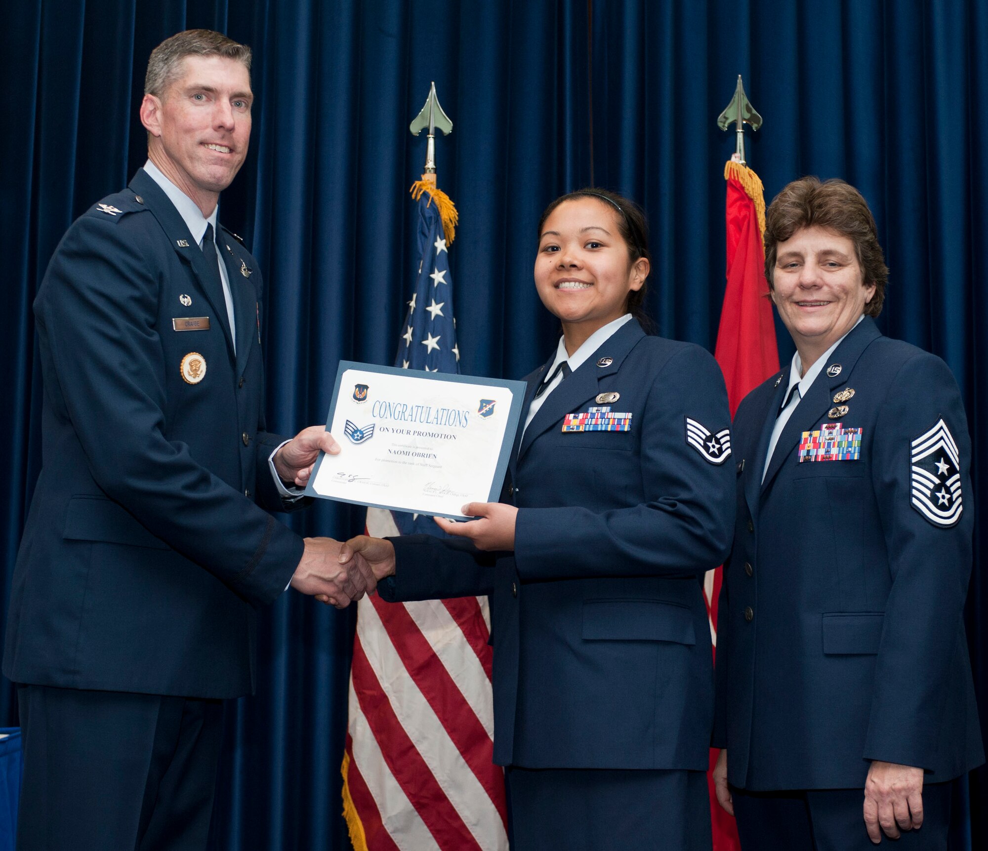 Naomi O'Brien, 39th Communications Squadron, is promoted to the rank of staff sergeant Oct. 31, 2011, in the Club Complex ballroom at Incirlik Air Base, Turkey.(U.S. Air Force photo by Senior Airman Clayton Lenhardt/Released)