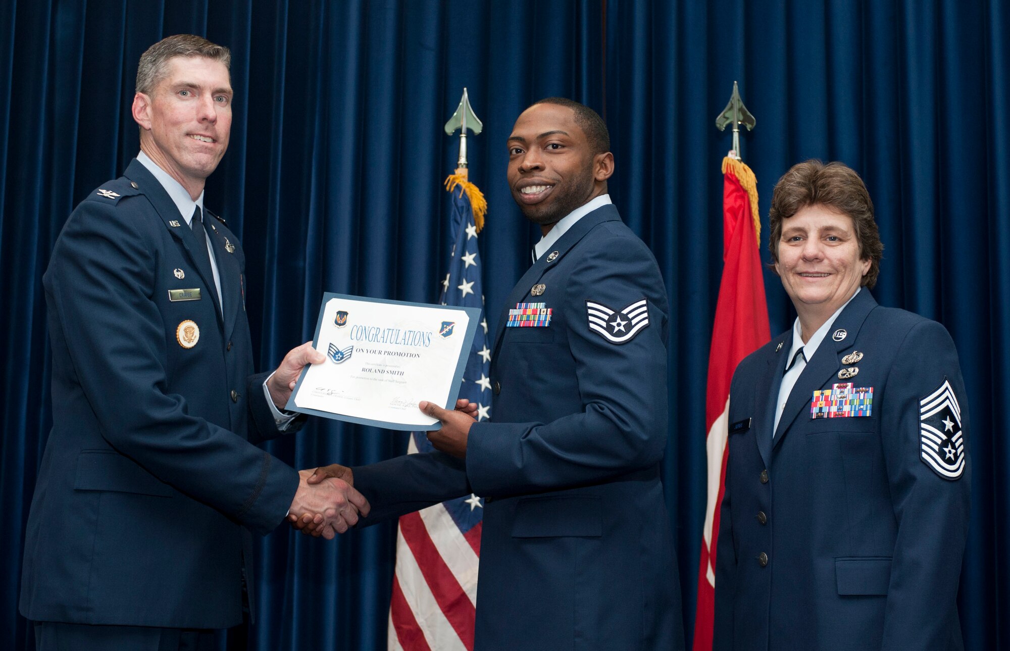 Roland Smith, 39th Communications Squadron, is promoted to the rank of staff sergeant Oct. 31, 2011, in the Club Complex ballroom at Incirlik Air Base, Turkey.(U.S. Air Force photo by Senior Airman Clayton Lenhardt/Released)