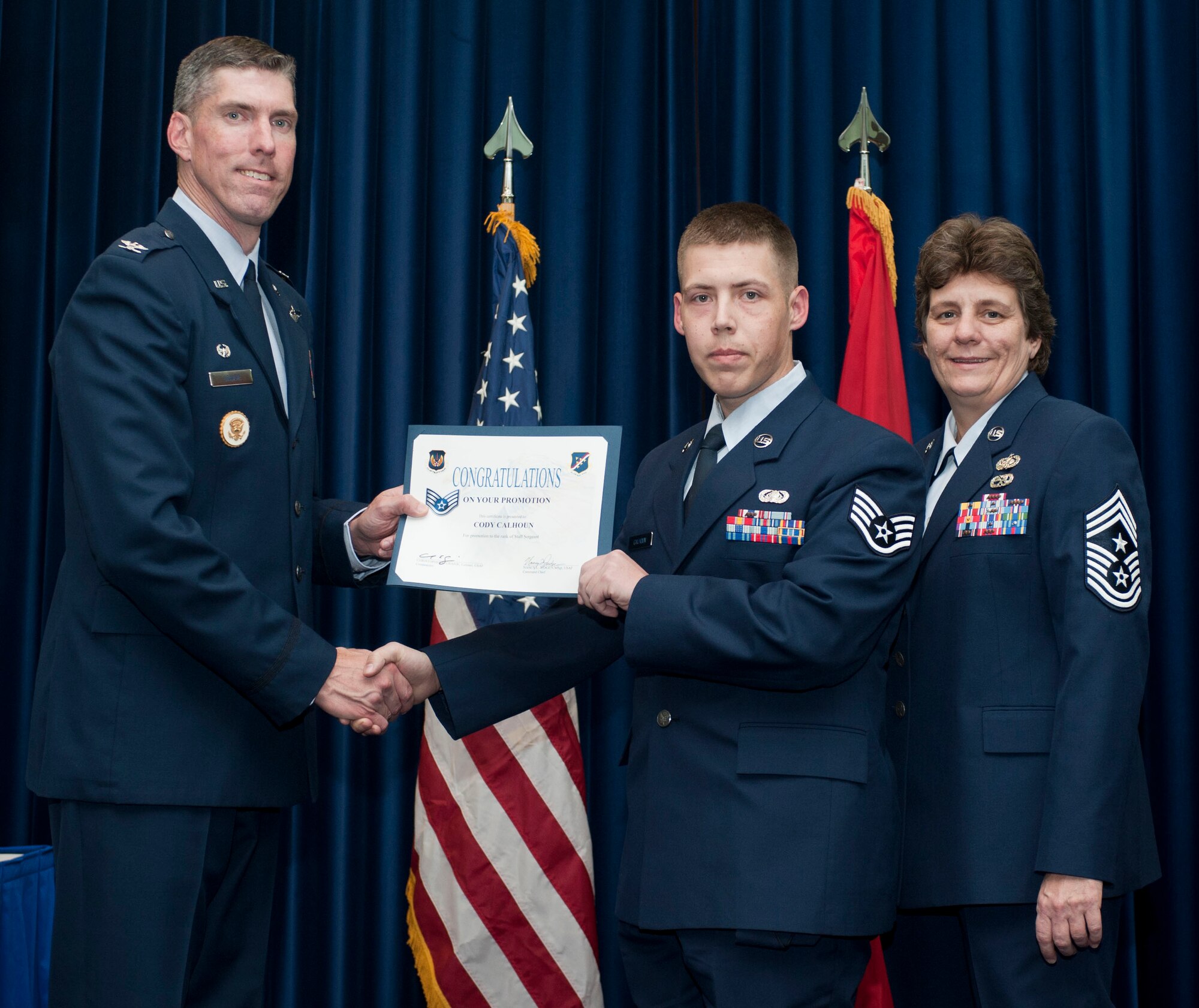 Cody Calhoun, 39th Communications Squadron, is promoted to the rank of staff sergeant Oct. 31, 2011, in the Club Complex ballroom at Incirlik Air Base, Turkey.(U.S. Air Force photo by Senior Airman Clayton Lenhardt/Released)