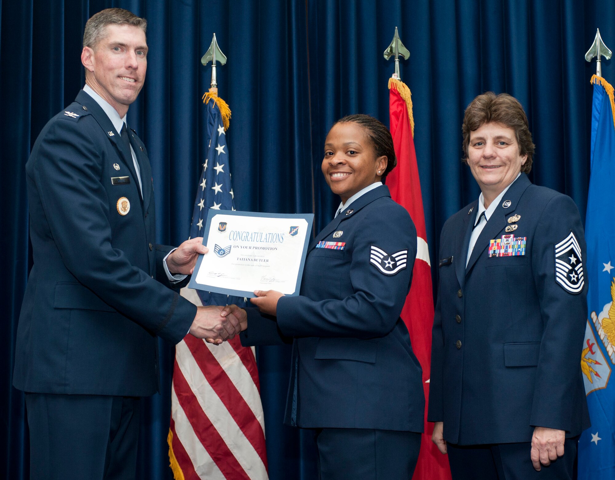 Tatiana Butler, 39th Logistics Readiness Squadron, is promoted to the rank of staff sergeant Oct. 31, 2011, in the Club Complex ballroom at Incirlik Air Base, Turkey.(U.S. Air Force photo by Senior Airman Clayton Lenhardt/Released)