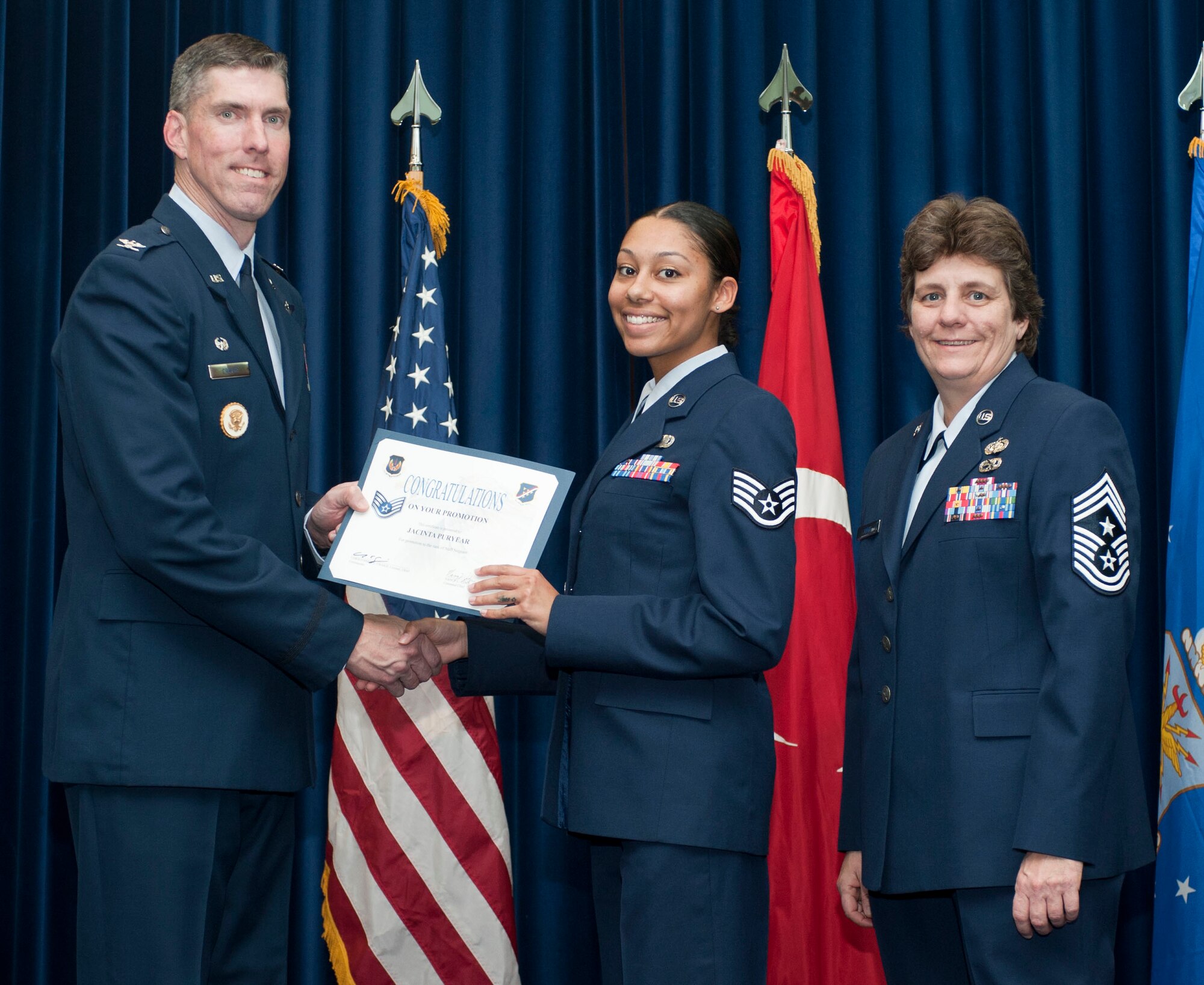 Jacinta Puryear, 39th Mission Support Group, is promoted to the rank of staff sergeant Oct. 31, 2011, in the Club Complex ballroom at Incirlik Air Base, Turkey.(U.S. Air Force photo by Senior Airman Clayton Lenhardt/Released)