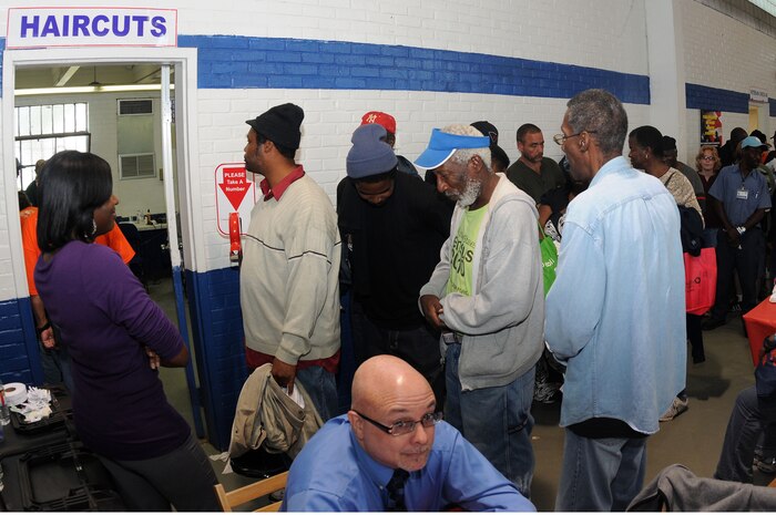 Homeless veterans wait for a haircut during the Stand Down Against Homelessness at the Armory Park Community Center, Oct. 27.  The Ralph H. Johnson Veteran Affairs Medical Center and the Goodwill Industries of the Lowcountry sponsored the 12th annual Stand Down Against Homelessness.  The event provided medical and dental assistance, clothing, food, haircuts and job and legal counseling for hundreds of homeless in the greater Charleston area.  (U.S. Navy photo/Mass Communication Specialist 3rd Class Brannon Deugan