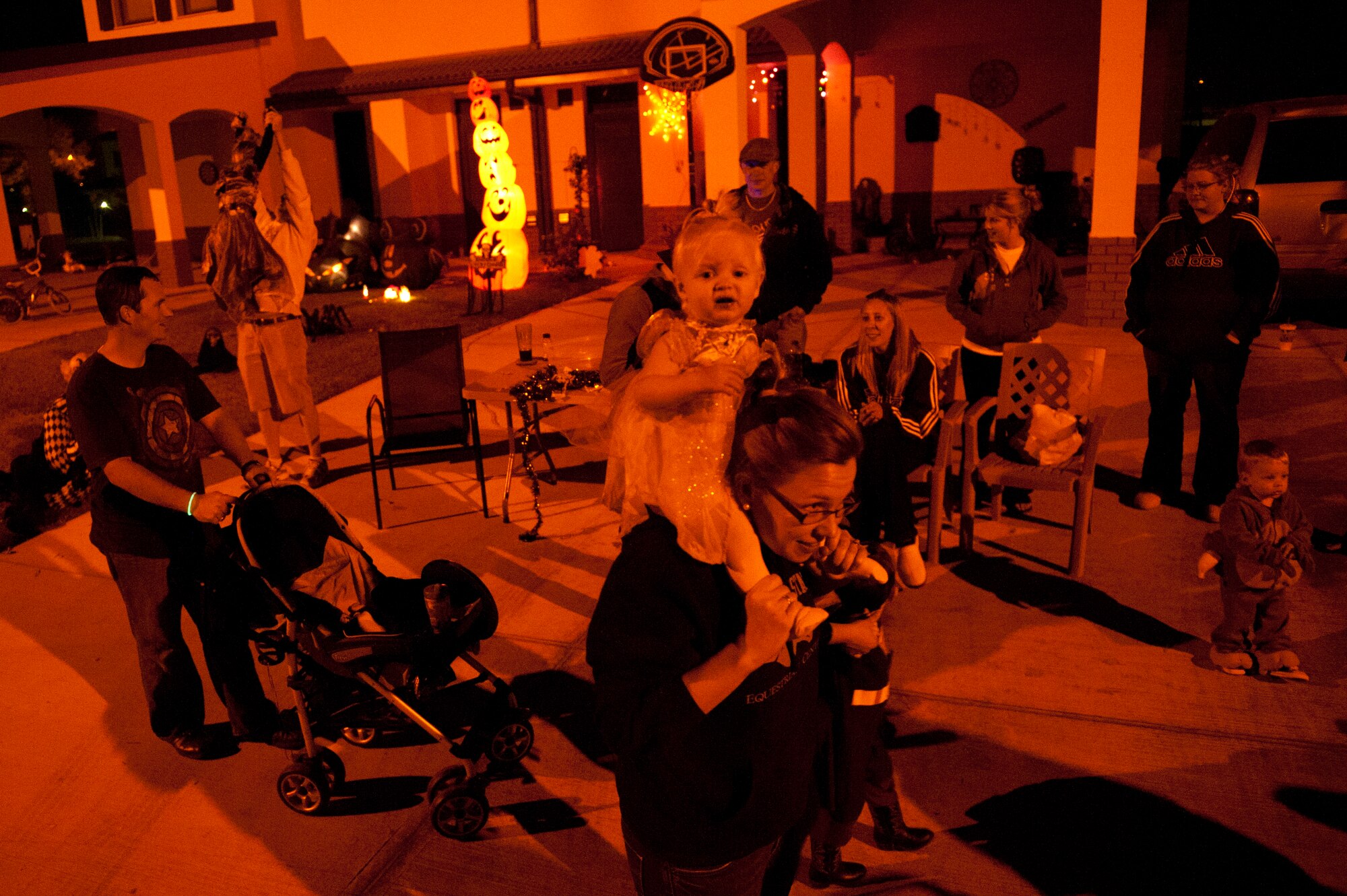 Team Incirlik members participate in trick or treating Oct. 31, 2011, at Incirlik Air Base, Turkey. Base housing was open from 6-8 p.m. for all ages to celebrate Halloween together, dress in costumes and collect treats. (U.S. Air Force photo by Tech. Sgt. Michael B. Keller/Released)