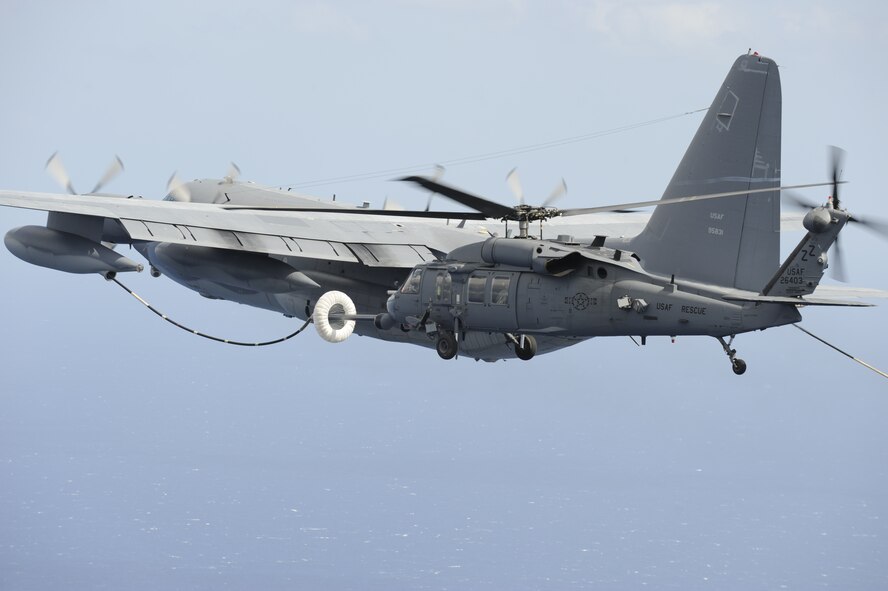 An MC-130P Combat Shadow from the 17th Special Operations Squadron refuels HH-60G Pave Hawks from the 33rd Rescue Squadron, both stationed at Kadena Air Base, Okinawa, as they fly to Osan Air Base Korea for PACIFIC THUNDER Oct. 27.

PACIFIC THUNDER is an annual 10-day exercise that takes place Oct. 31- Nov. 9 at Osan Air Base, Korea involving the 33rd Rescue Squadron, Kadena Air Base, Japan, and the 25th Fighter Squadron, Osan Air Base, Korea. These units work together to practice Combat Search and Rescue tactics to prepare for real-world emergency situations. 
(U.S. Air Force photo/Tech. Sgt. Angelique Bilog)