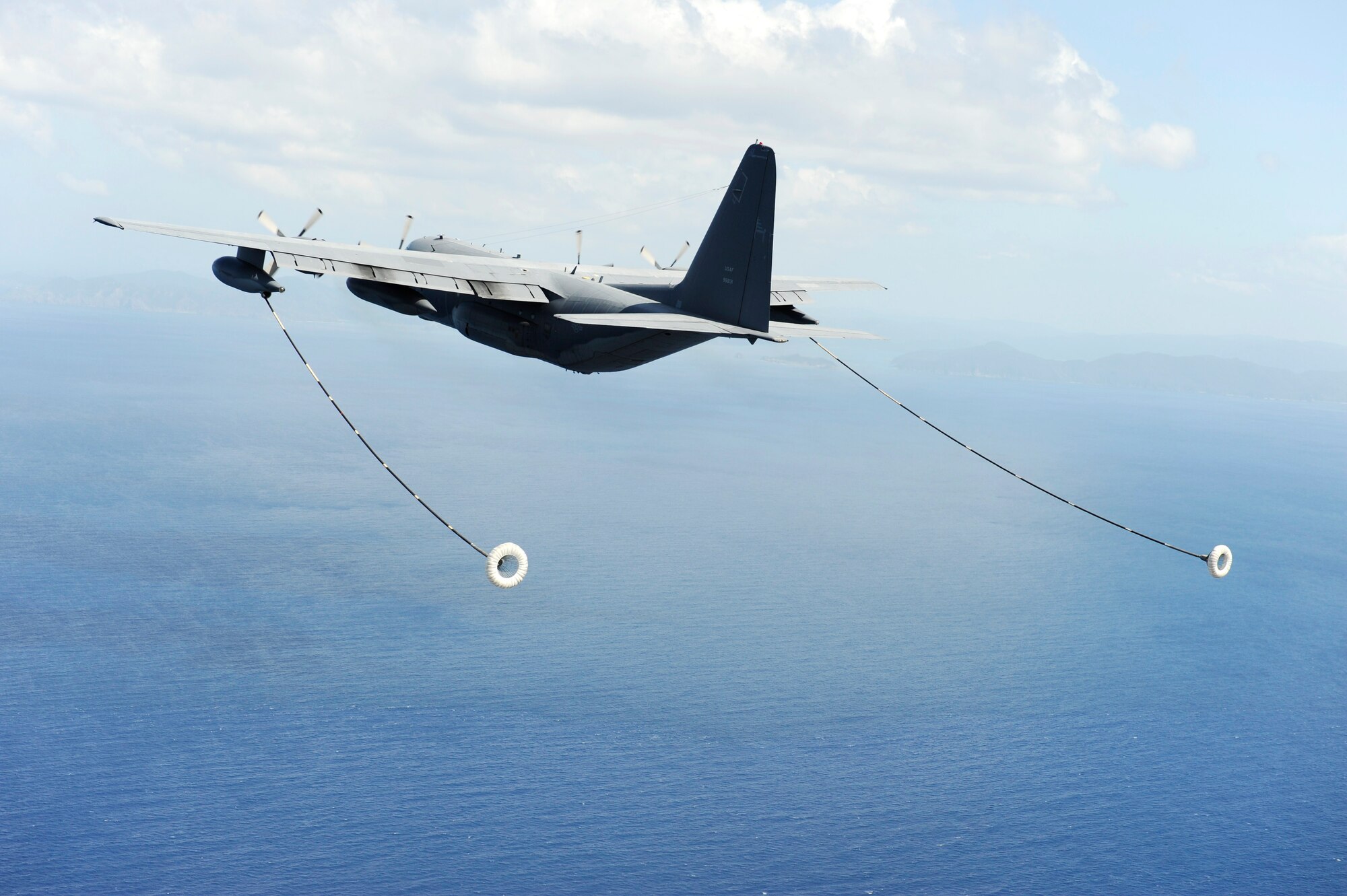 An MC-130P Combat Shadow from the 17th Special Operations Squadron prepares to refuel HH-60G Pave Hawks from the 33rd Rescue Squadron, both stationed at Kadena Air Base, Okinawa, as they fly to Osan Air Base Korea for PACIFIC THUNDER Oct. 27.

PACIFIC THUNDER is an annual 10-day exercise that takes place Oct. 31- Nov. 9 at Osan Air Base, Korea involving the 33rd Rescue Squadron, Kadena Air Base, Japan, and the 25th Fighter Squadron, Osan Air Base, Korea. These units work together to practice Combat Search and Rescue tactics to prepare for real-world emergency situations. 
(U.S. Air Force photo/Tech. Sgt. Angelique Bilog)
