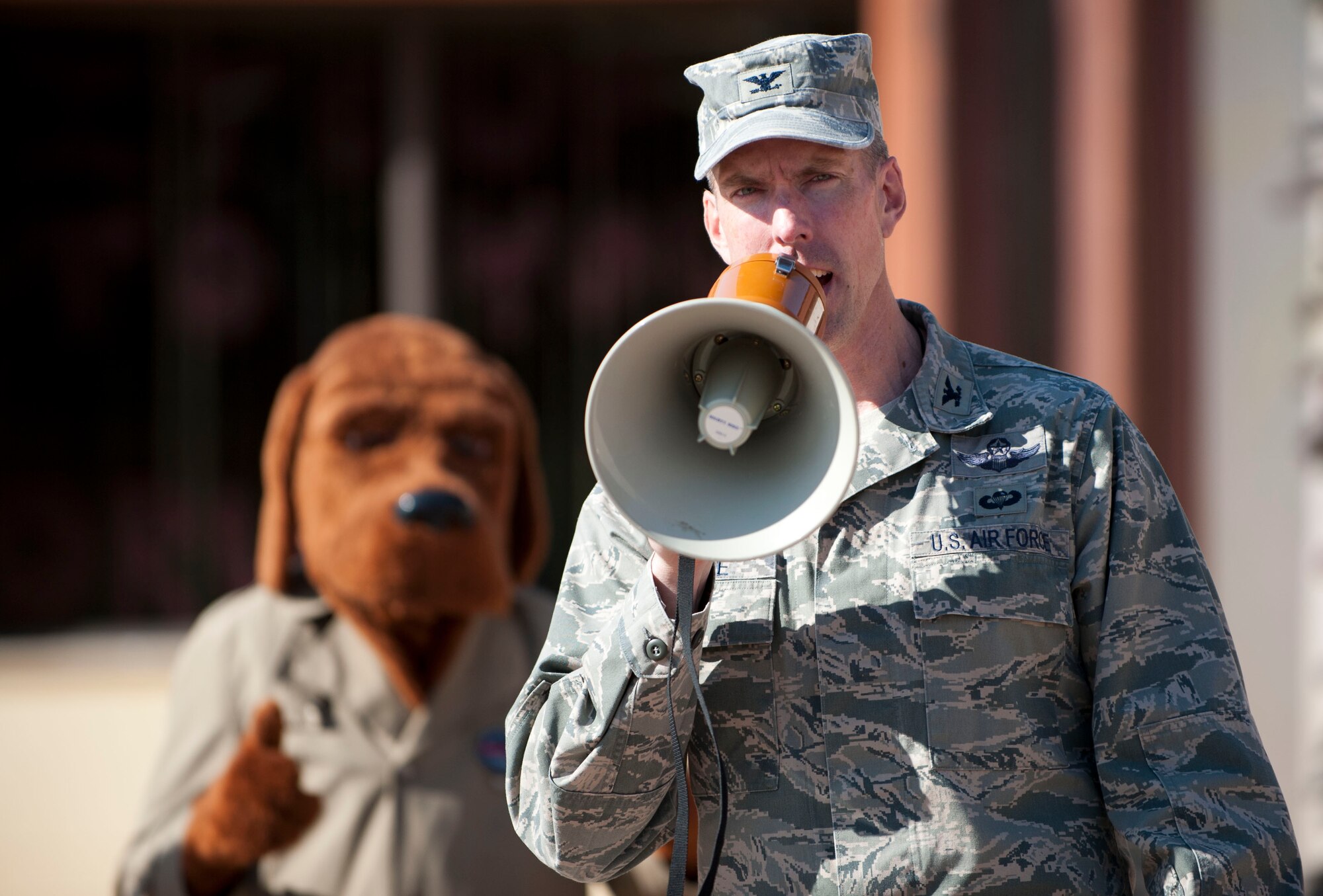Col. Chris Craige, 39th Air Base Wing commander, speaks to schoolchildren after a parade celebrating Red Ribbon Week, Oct. 28, 2011, at Incirlik Air Base, Turkey. Red Ribbon Week is a campaign that promotes drug prevention and education with the ultimate goal of a drug-free America. Red Ribbon Week was celebrated Oct. 23-31 this year. (U.S. Air Force photo by Senior Airman Clayton Lenhardt/Released)