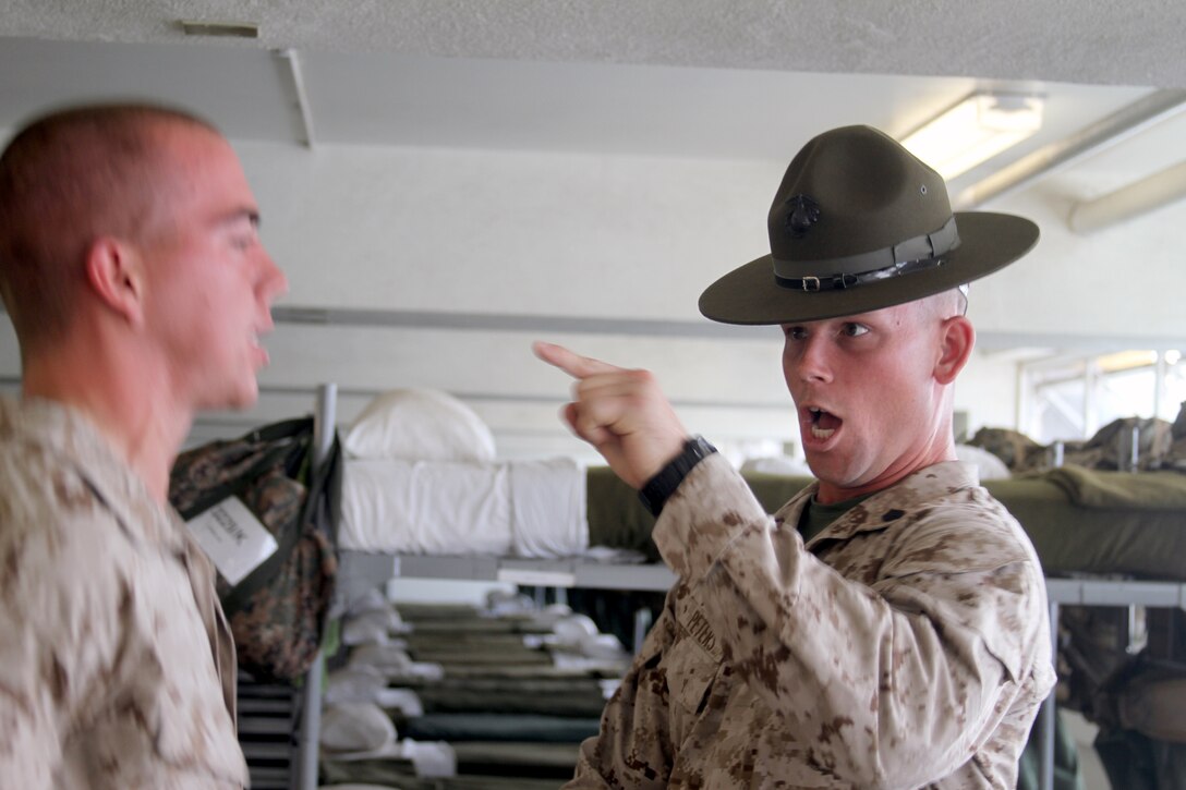 Sgt. Mark Peters, drill instructor, Company K, 3rd Recruit Training Battalion and his younger sister, Sgt. Amanda Peters, drill instructor, Company N, 4th Recruit Training Battalion, Parris Island, S.C. spend endless hours training recruits in hopes to meet their goal.::r::::n::::r::::n::