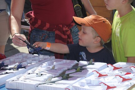 A record crowd of 150,000 attended the 2011 Randolph Air Force Base Airshow Oct. 30. Headlining this year's event were the U.S. Navy Blue Angels. (U.S. Air Force photo/Joel Martinez)