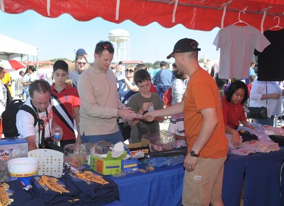 A record crowd of 150,000 attended the 2011 Randolph Air Force Base Airshow Oct. 30. Headlining this year's event were the U.S. Navy Blue Angels. (U.S. Air Force photo/Joel Martinez)