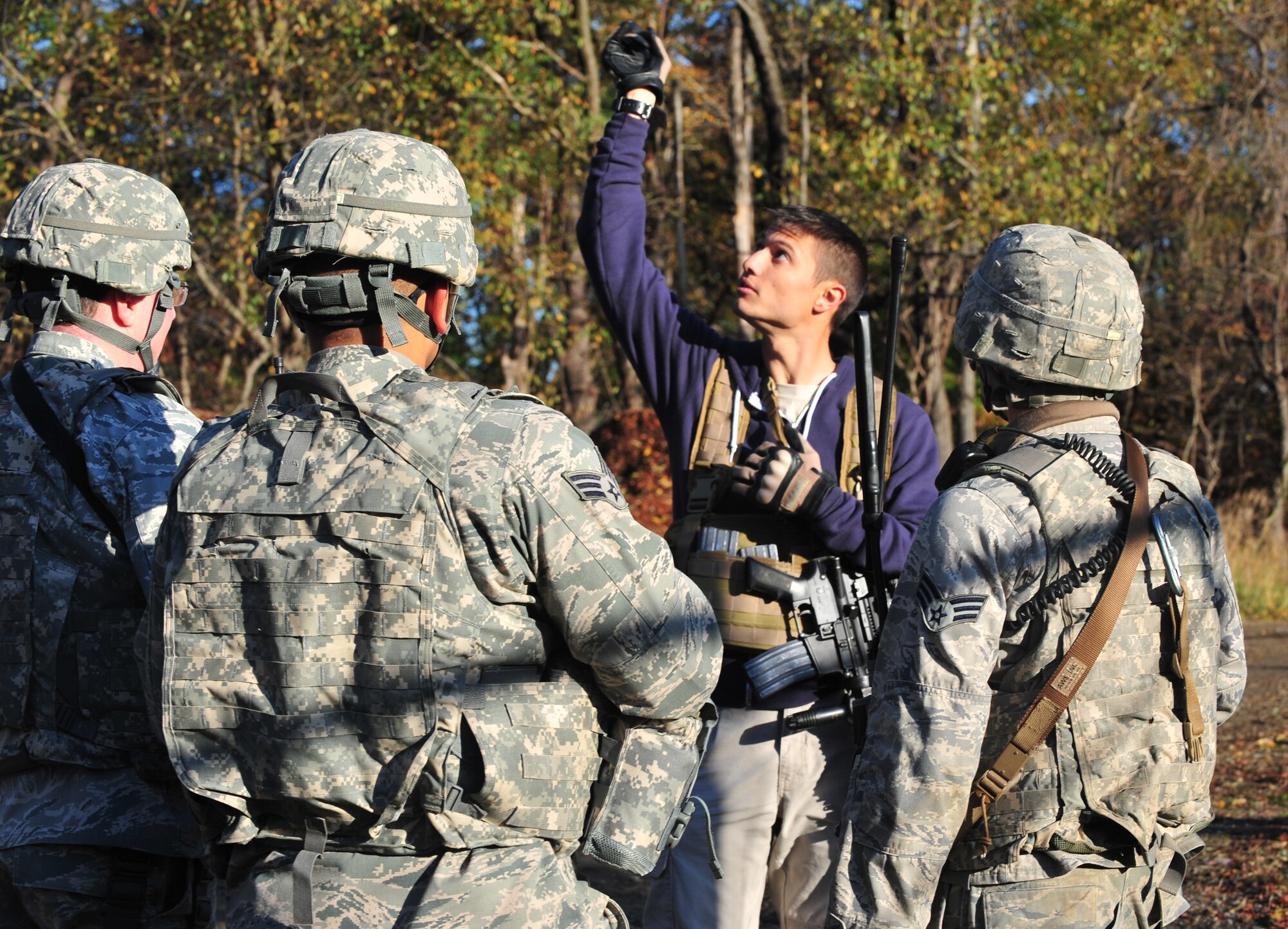 U.S. Air Force Senior Airman Donald Williams, 823rd Base Defense Squadron force protection analyst, plays the part of a local villager during a joint exercise between the 823rd BDS and 105th Security Forces Squadron at Camp Smith, N.Y., Oct. 28, 2011. Williams has a security forces background but works closely with the intelligence section. As one of only two analysts within the 823rd BDS, he facilitates information gathered by intelligence and force protection requirements and relays it to troops on the ground.  (U.S. Air Force photo by Staff Sgt. Stephanie Mancha/Released)
