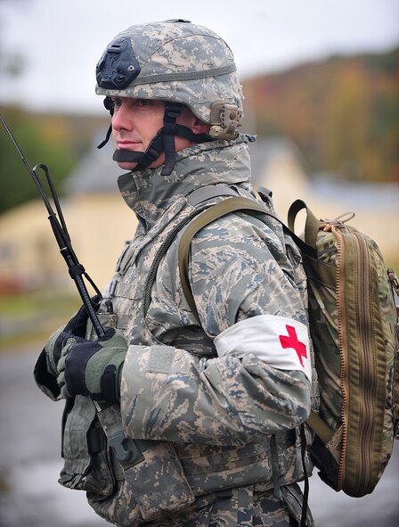 U.S. Air Force Capt. Jimmy Stanley, 823rd Base Defense Squadron physician assistant, observes Airmen as they practice techniques they learned during the joint training between the 823rd BDS and 105th Security Forces Squadron at Camp Smith, N.Y., Oct 27, 2011. Stanley added medical injects during the training which allowed the Airmen to practice their new skills. He was also prepared for any real-world injuries that could occur during the training. (U.S. Air Force photo by Staff Sgt. Stephanie Mancha/Released)