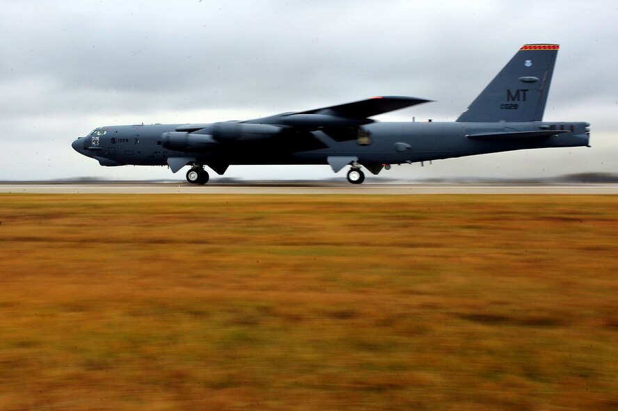 MINOT AIR FORCE BASE, N.D. – A B-52H Stratofortress takes off as part of rapid launch during an annual field training and battle staff exercise here Oct. 25. As a finale to the two week-long exercise, several B-52s took off in rapid succession, signaling the end of the training mission. The exercise provides training opportunities for forces to deter, and if necessary defeat, a military attack against the United States. (U.S. Air Force Photo/Senior Airman Jesse Lopez)