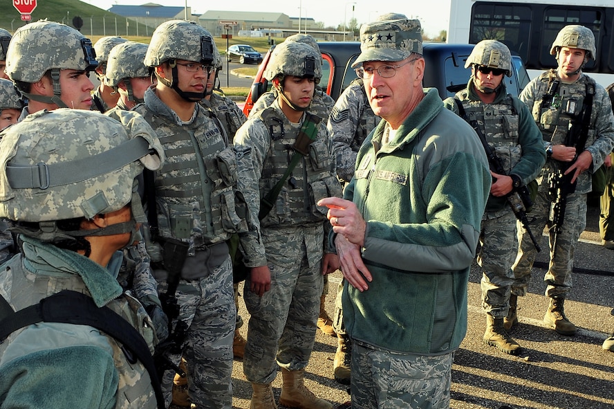 MINOT AIR FORCE BASE, N.D. -- Gen. C. Robert Kehler, U.S. Strategic Command commander visits Security Forces Airmen during U.S. STRATCOM’s annual field training and battle staff exercise here Oct. 20. Kehler made the trip to the base to observe Airmen participating in the exercise at the nation’s only dual-wing nuclear capable base. The exercise provides training opportunities for forces to deter, and if necessary defeat, a military attack against the United States. (U.S. Air Force Photo/Senior Airman Jesse Lopez)