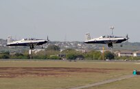 Pilots from Randolph Air Force Base fly Randolph's own T-6A Texan II in the 2011 Randolph Air Force Base Airshow Oct.29. Randolph is an instructor pilot base-training pilots to train others. (U. S. Air Force Photo by Don Lindsey)