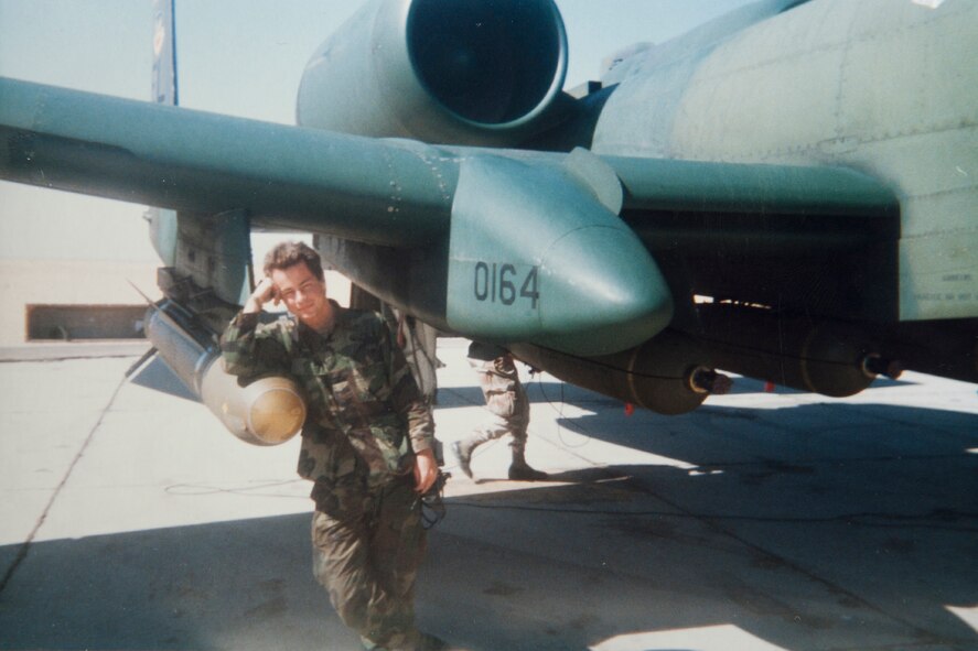 A young U.S. Air Force Master Sgt. William Godwin poses next to an A-10 Thunderbolt in early 1991 during a deployment to Saudi Arabia. Godwin deployed with the 76th Tactical Fighter Squadron in support of Operation Desert Storm. He joined the military in 1989 loading munitions for A-10 Thunderbolts but now works with HH-60G Pave Hawks with the 41st Rescue Squadron at Moody Air Force Base, Ga. (Courtesy photo) 