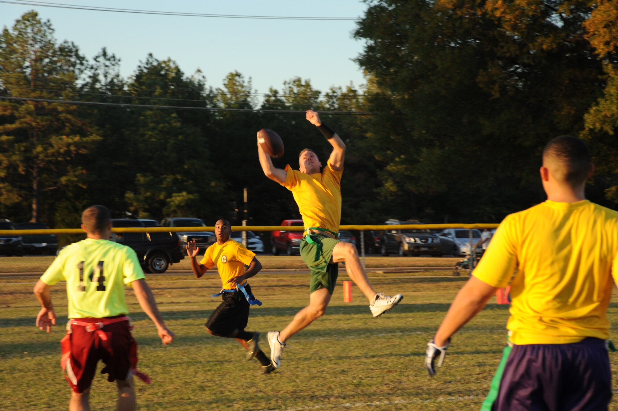 Matt Musser, a 19th Operations Group safety, intercepts a pass Tuesday in the first of half of the flag football game between the Marines and the 19th OG. Despite turning the ball over on their first five possessions, the Marines rallied late to defeat the 19th OG 16-14. (U.S. Air Force photo by Airman 1st Class Kaylee Clark)