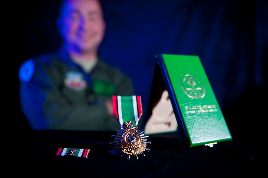 A Kuwait Liberation Medal owned by U.S. Air Force Master Sgt. William Godwin, 41st Rescue Squadron acting first sergeant, rests on display Nov. 2, 2011, at Moody Air Force Base, Ga. Godwin received the medal from the Saudi Arabian government for his participation in Operation Desert Storm and the liberation of Kuwait between Jan. 17, 1991, and Feb. 28, 1991. (U.S. Air Force photo by Staff Sgt. Jamal D. Sutter/Released) 
