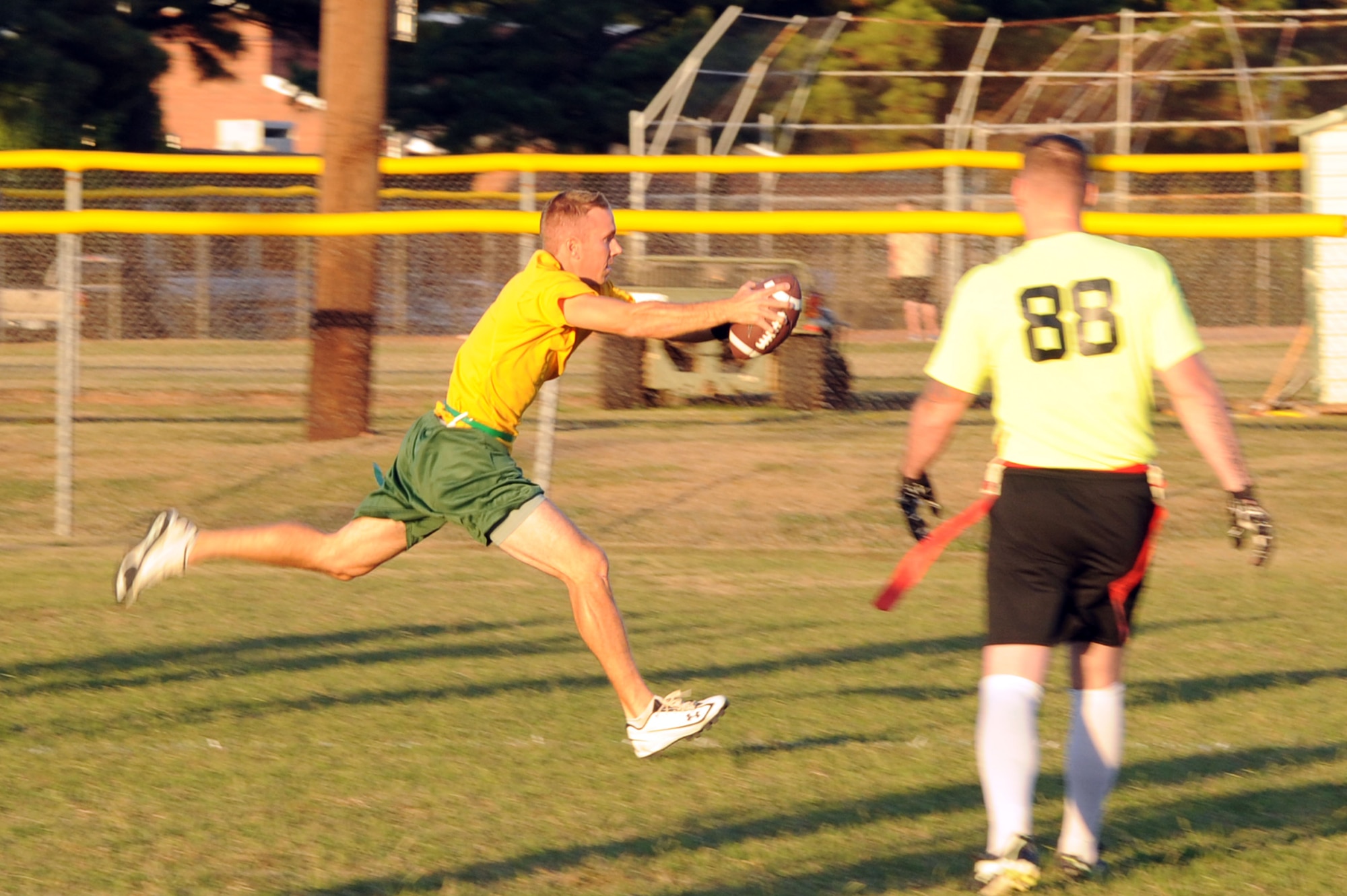 Matt Musser, a 19th Operations Group safety, intercepts a pass Tuesday in the first of half of the flag football game between the Marines and the 19th OG. Despite turning the ball over on their first five possessions, the Marines rallied late to defeat the 19th OG 16-14. (U.S. Air Force photo by Airman 1st Class Kaylee Clark)