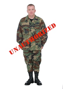 The traditional Battle Dress Uniform, worn by U.S. service members for 25
years, was phased out by the Air Force Nov. 1 and is no longer authorized
for wear. Worn both in garrison and at deployed locations, the BDU and the
Desert Camouflage Uniform were replaced by the Airman Battle Uniform. (Photo
by Armando Flores)
