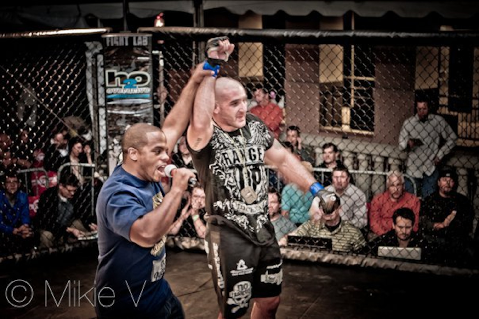 Staff Sgt. Ferdinando Acerra, Staff Sgt. Ferdinando Acerra, 20th Maintenance Operations Squadron, Shaw AFB, S.C., maintenance training flight instructor and Mixed Martial Arts (MMA) fighter, wins a fight. Acerra along with others will be participating in the MMA cage fight on Seymour Johnson Air Force Base, N.C., Nov. 4, 2011. (Courtesy photo)
