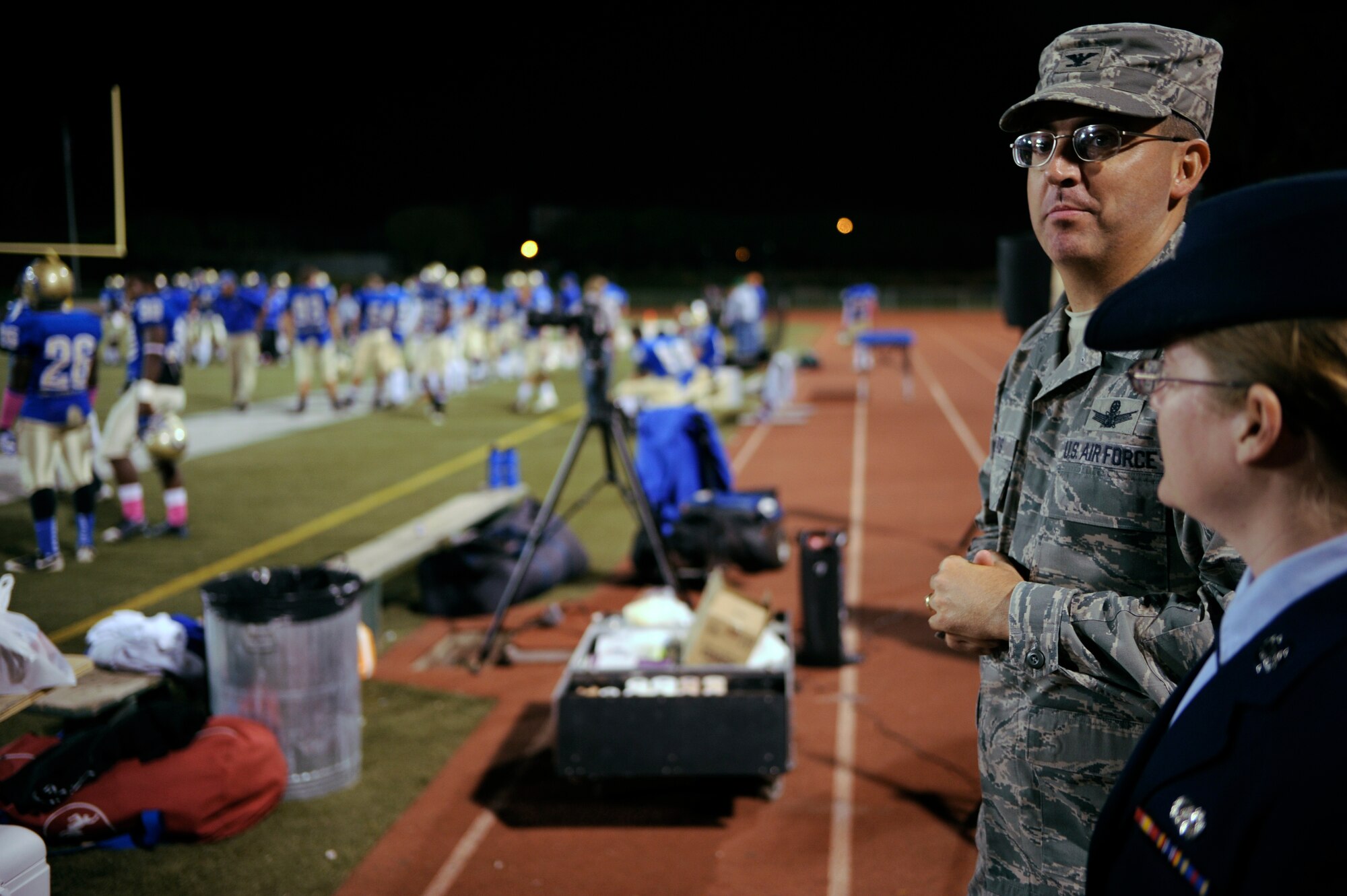SANTA MARIA, Calif. -- Col. Keith Balts, 30th Space Wing vice commander, stands on the sidelines during halftime at Righetti High School Stadium during the Military Appreciation Night football game Saturday, Oct. 29, 2011. Military members received free admission and food at the game, which pitted the Bulldogs against the Ventura College Pirates. (U.S. Air Force photo/Staff Sgt. Andrew Satran) 
