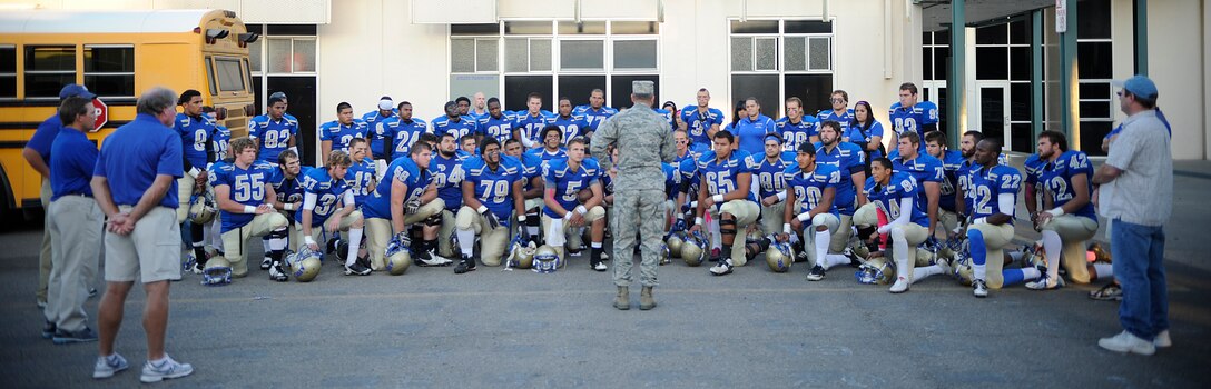 SANTA MARIA, Calif. -- Col. Keith Balts, 30th Space Wing vice commander, gives a pep talk to the Allan Hancock College Bulldogs at the Military Appreciation Night football game at the Righetti High School Stadium Saturday, Oct. 29, 2011. Military members received free admission and food at the game, which pitted the Bulldogs against the Ventura College Pirates. (U.S. Air Force photo/Staff Sgt. Andrew Satran) 