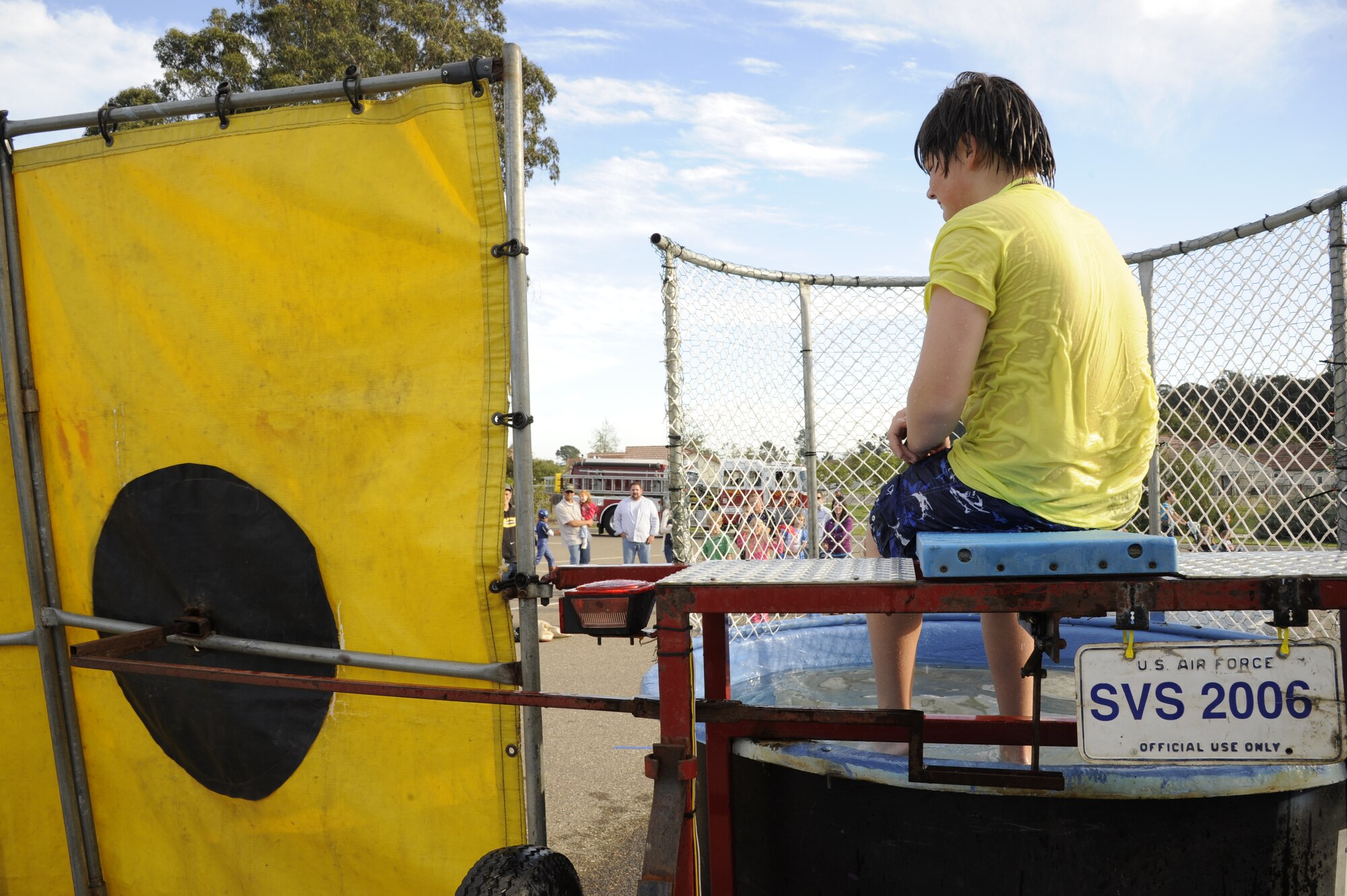VANDENBERG AIR FORCE BASE, Calif. --   Devin Danehy, a military dependent, sits on the dunk tank during the base's Fall Festival Sunday, Oct. 30, 2011.  The festival was an event for all military personnel and their families hosted by the Vandenberg Chapel Staff to thank servicemembers serving at home and abroad. (U.S. Air Force photo/Senior Airman Lael Huss) 